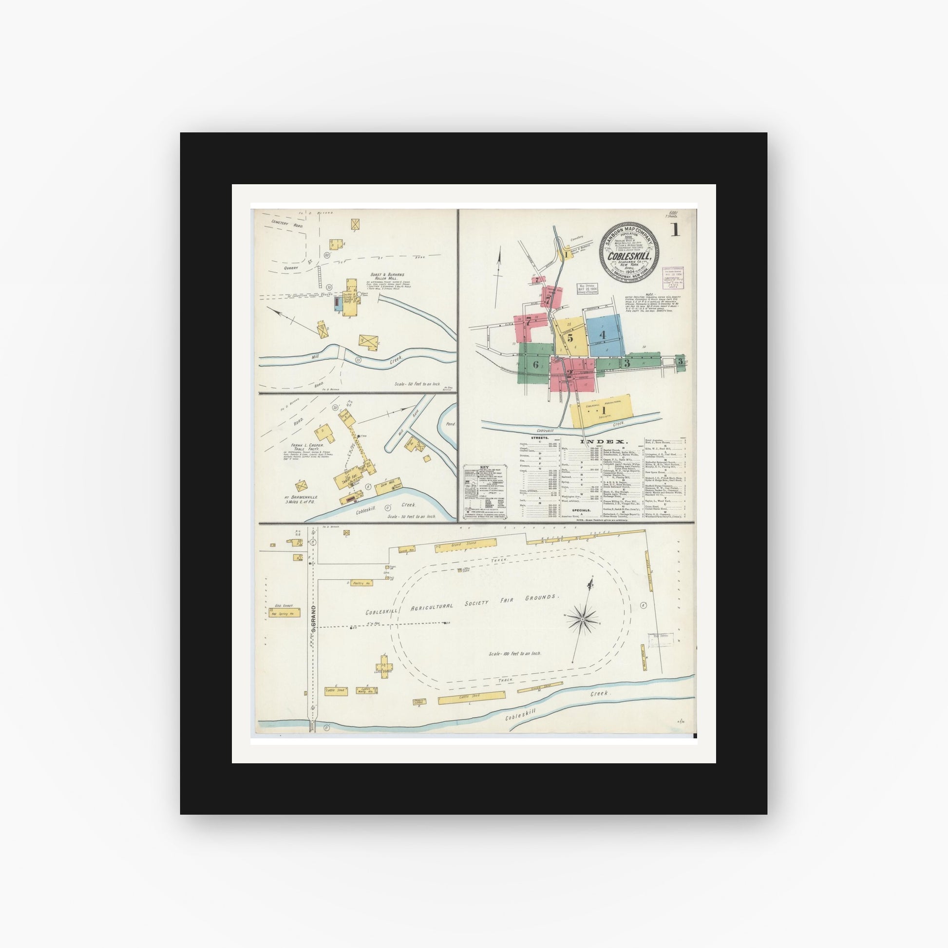 Old map wall art mockup — black gallery frame with white mat — Sanborn Fire Insurance Map from Cobleskill, Schoharie County, New York (1904), Sheet #0001