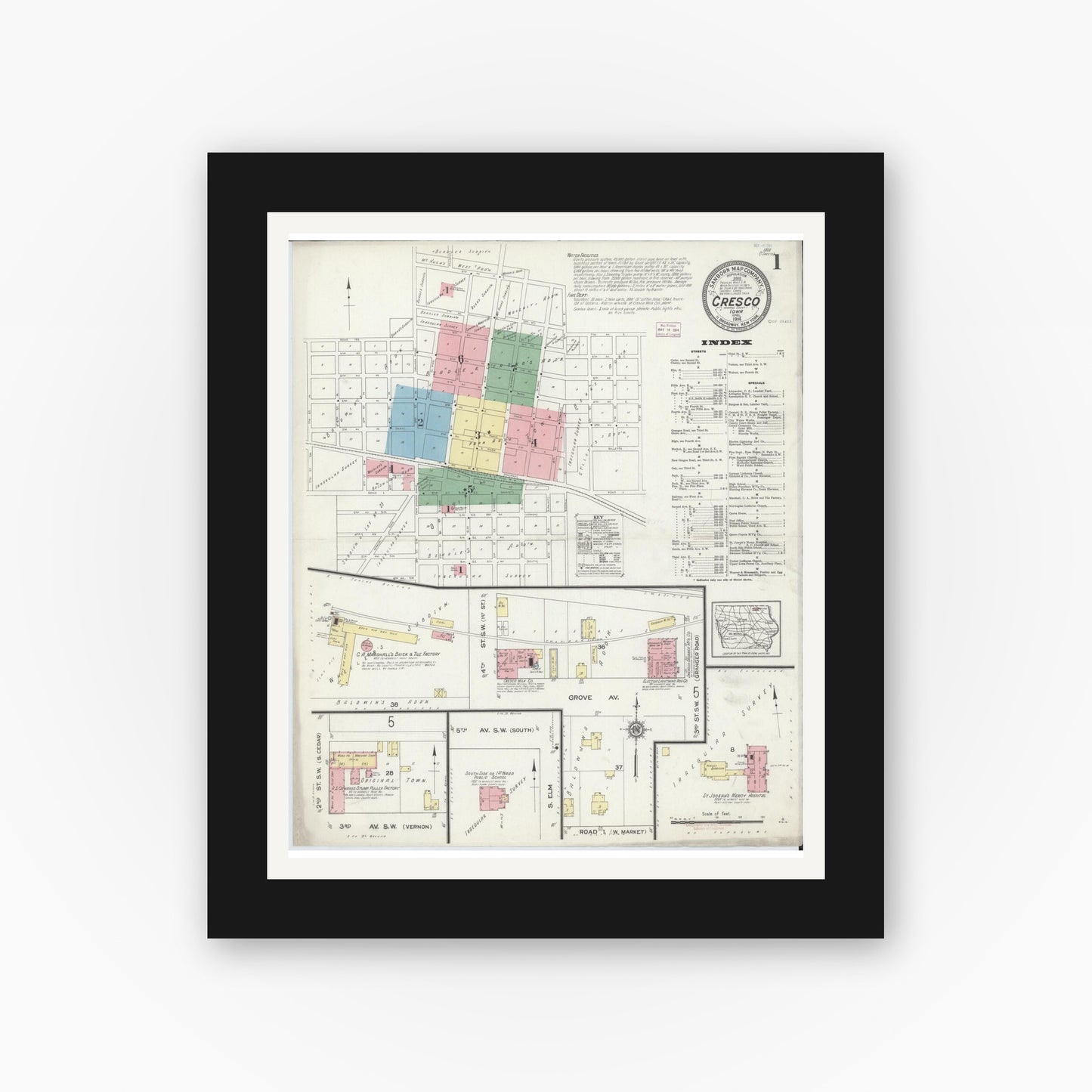 Old map wall art mockup — black gallery frame with white mat — Sanborn Fire Insurance Map from Cresco, Howard County, Iowa (1914) â€” Complete Set