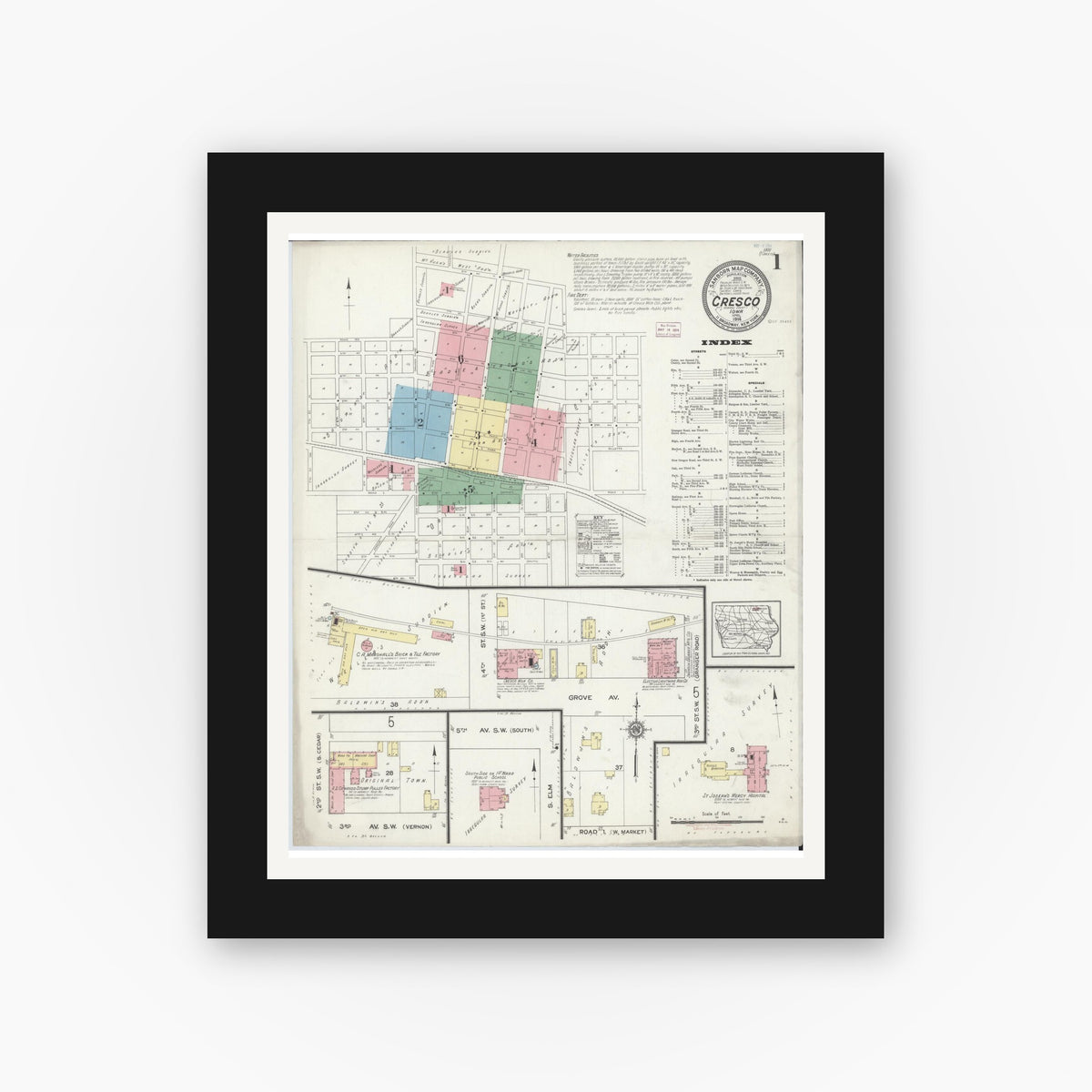 Old map wall art mockup — black gallery frame with white mat — Sanborn Fire Insurance Map from Cresco, Howard County, Iowa (1914) â€” Complete Set