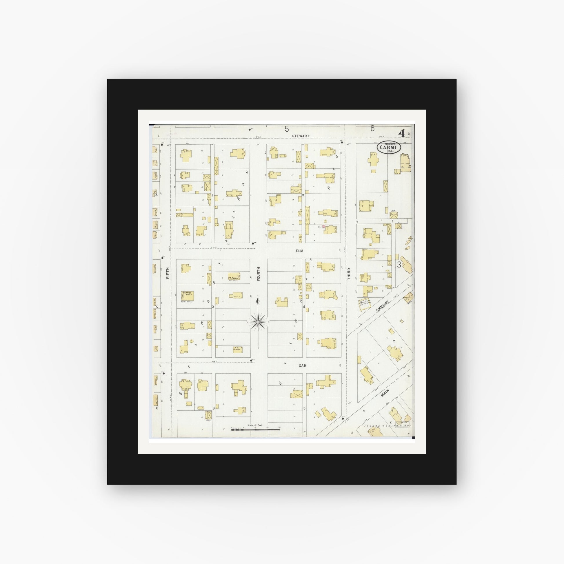 Old map wall art mockup — black gallery frame with white mat — Sanborn Fire Insurance Map from Carmi, White County, Illinois (1899), Sheet #0004
