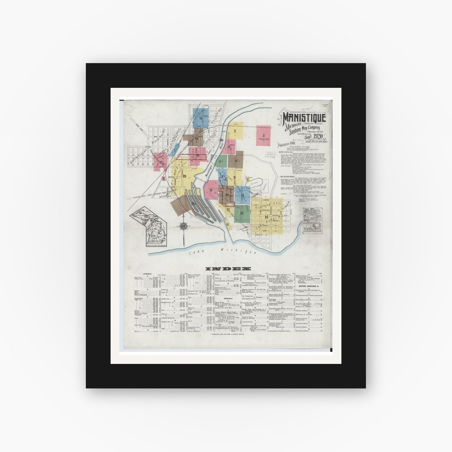 Old map wall art mockup — black gallery frame with white mat — Sanborn Fire Insurance Map from Manistique, Schoolcraft County, Michigan (1920), Sheet #0001