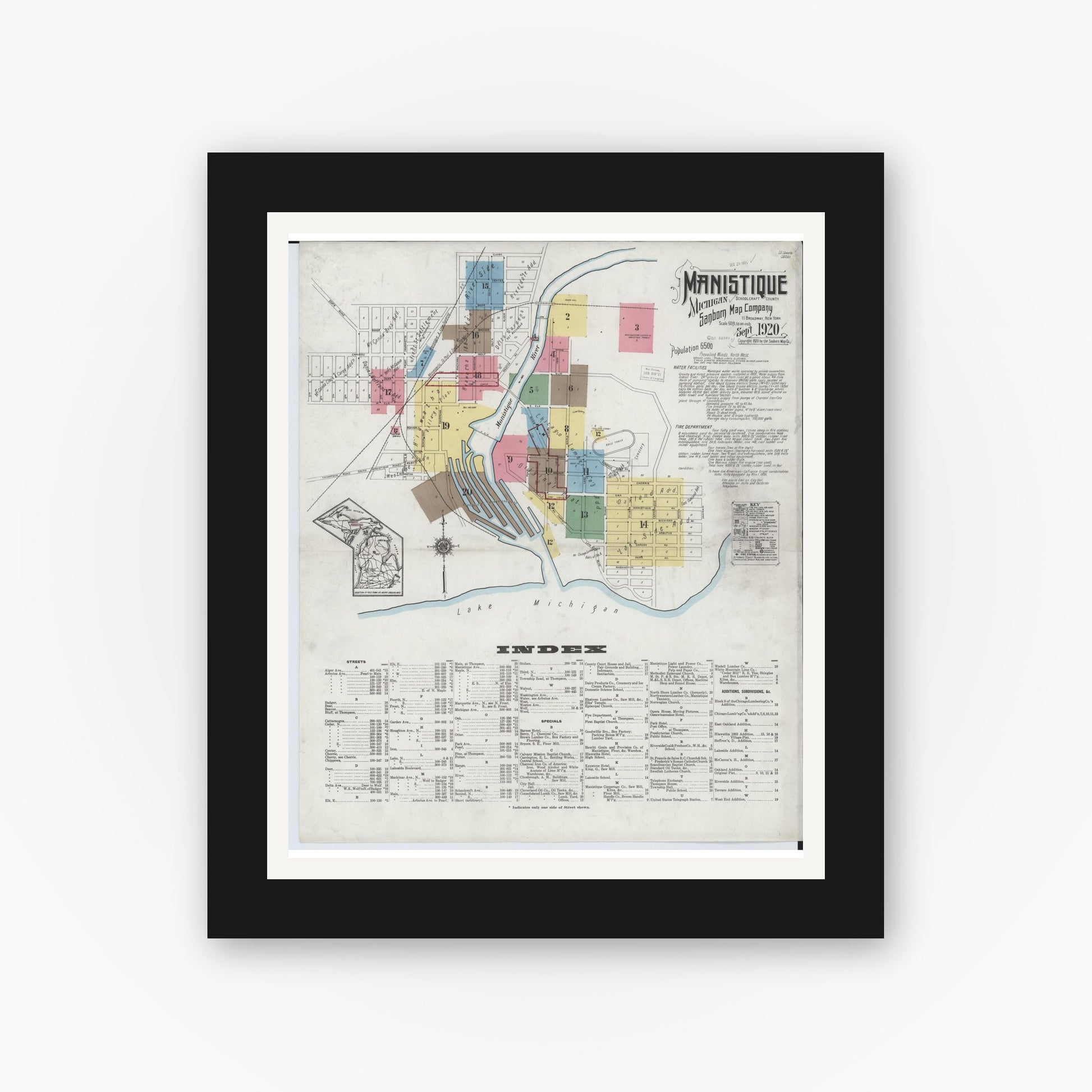 Old map wall art mockup — black gallery frame with white mat — Sanborn Fire Insurance Map from Manistique, Schoolcraft County, Michigan (1920), Sheet #0001