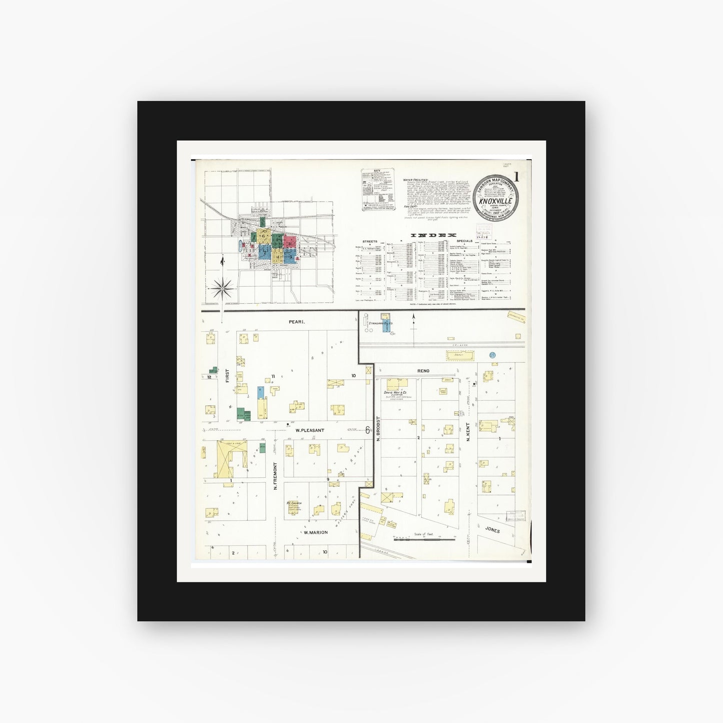 Old map wall art mockup — black gallery frame with white mat — Sanborn Fire Insurance Map from Knoxville, Marion County, Iowa (1907) â€” Complete Set