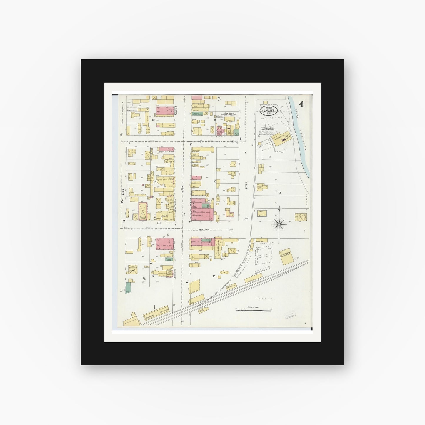 Old map wall art mockup — black gallery frame with white mat — Sanborn Fire Insurance Map from Evart, Osceola County, Michigan (1899), Sheet #0004