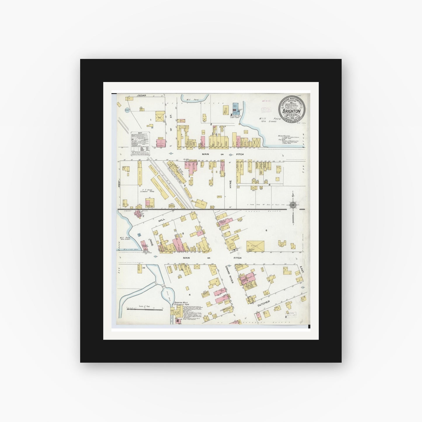 Old map wall art mockup — black gallery frame with white mat — Sanborn Fire Insurance Map from Brighton, Livingston County, Michigan (1910), Sheet #0001