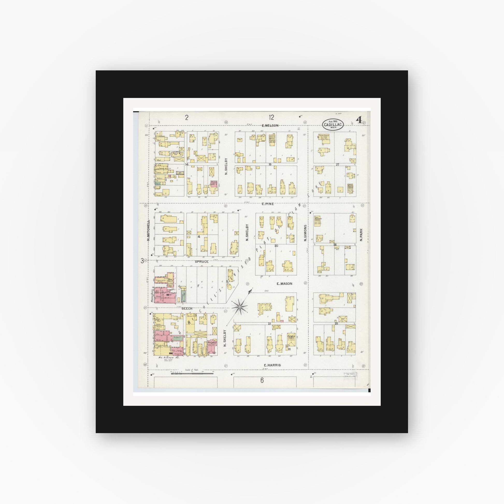 Old map wall art mockup — black gallery frame with white mat — Sanborn Fire Insurance Map from Cadillac, Wexford County, Michigan (1900), Sheet #0004