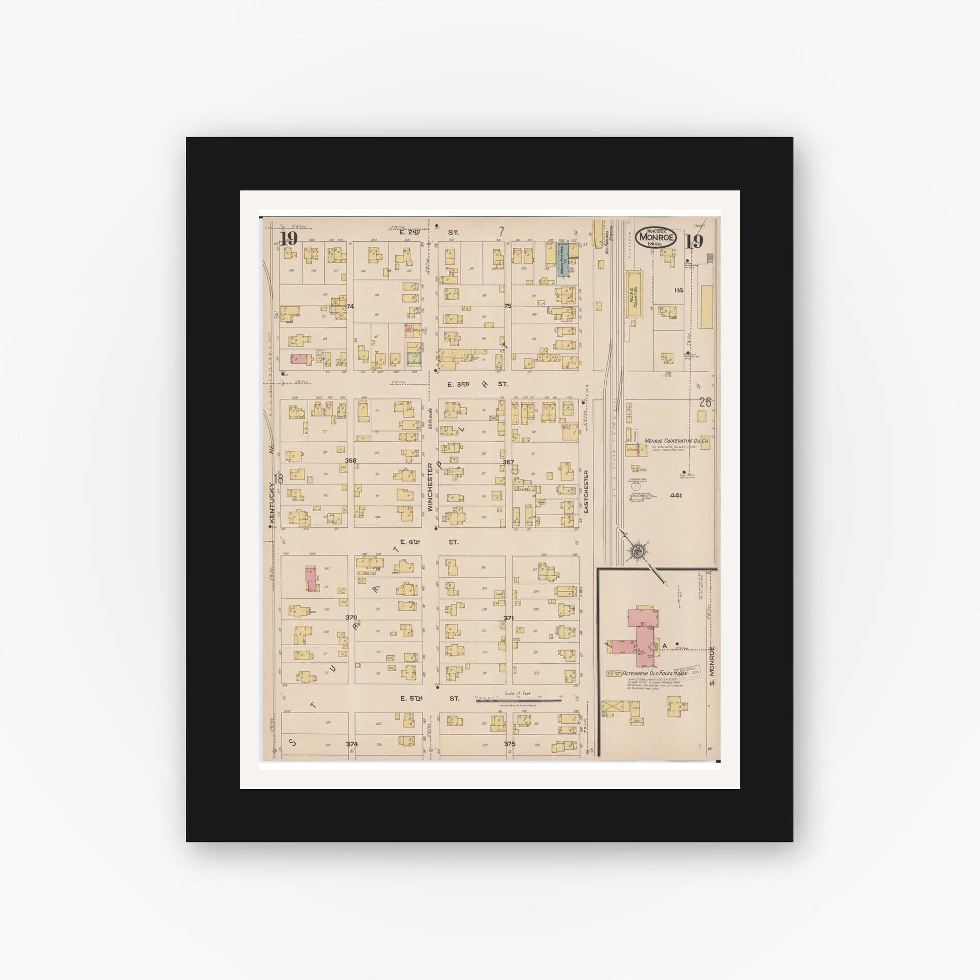 Old map wall art mockup — black gallery frame with white mat — Sanborn Fire Insurance Map from Monroe, Monroe County, Michigan (1922), Sheet #0019