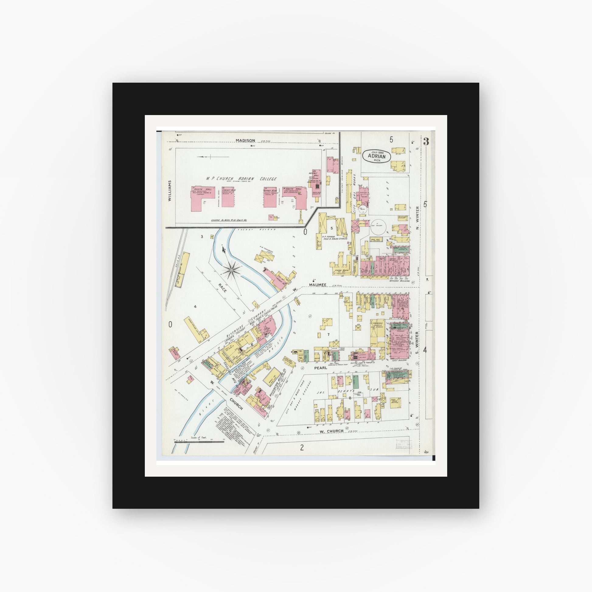 Old map wall art mockup — black gallery frame with white mat — Sanborn Fire Insurance Map from Adrian, Lenawee County, Michigan (1899), Sheet #0003