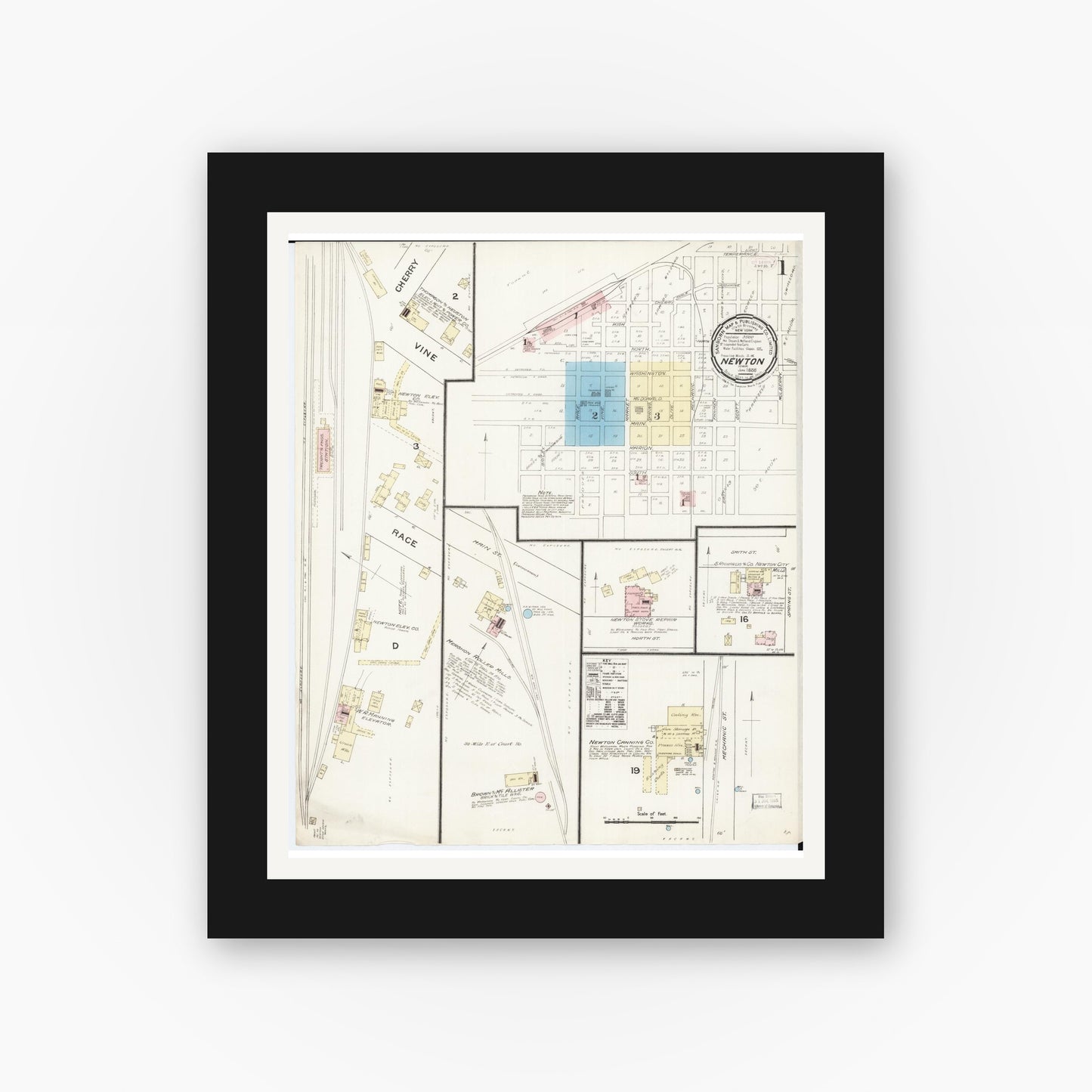 Old map wall art mockup — black gallery frame with white mat — Sanborn Fire Insurance Map from Newton, Jasper County, Iowa (1888) â€” Complete Set
