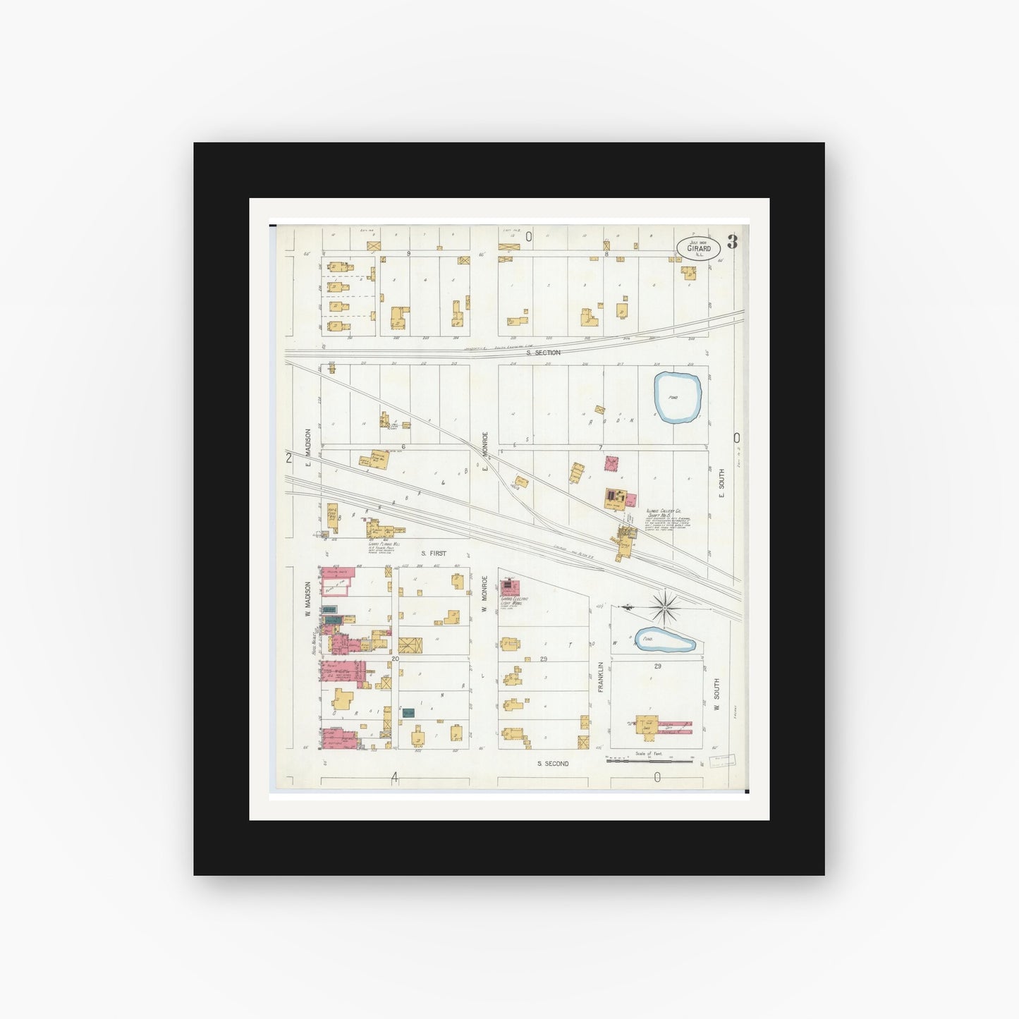 Old map wall art mockup — black gallery frame with white mat — Sanborn Fire Insurance Map from Girard, Macoupin County, Illinois (1906), Sheet #0003