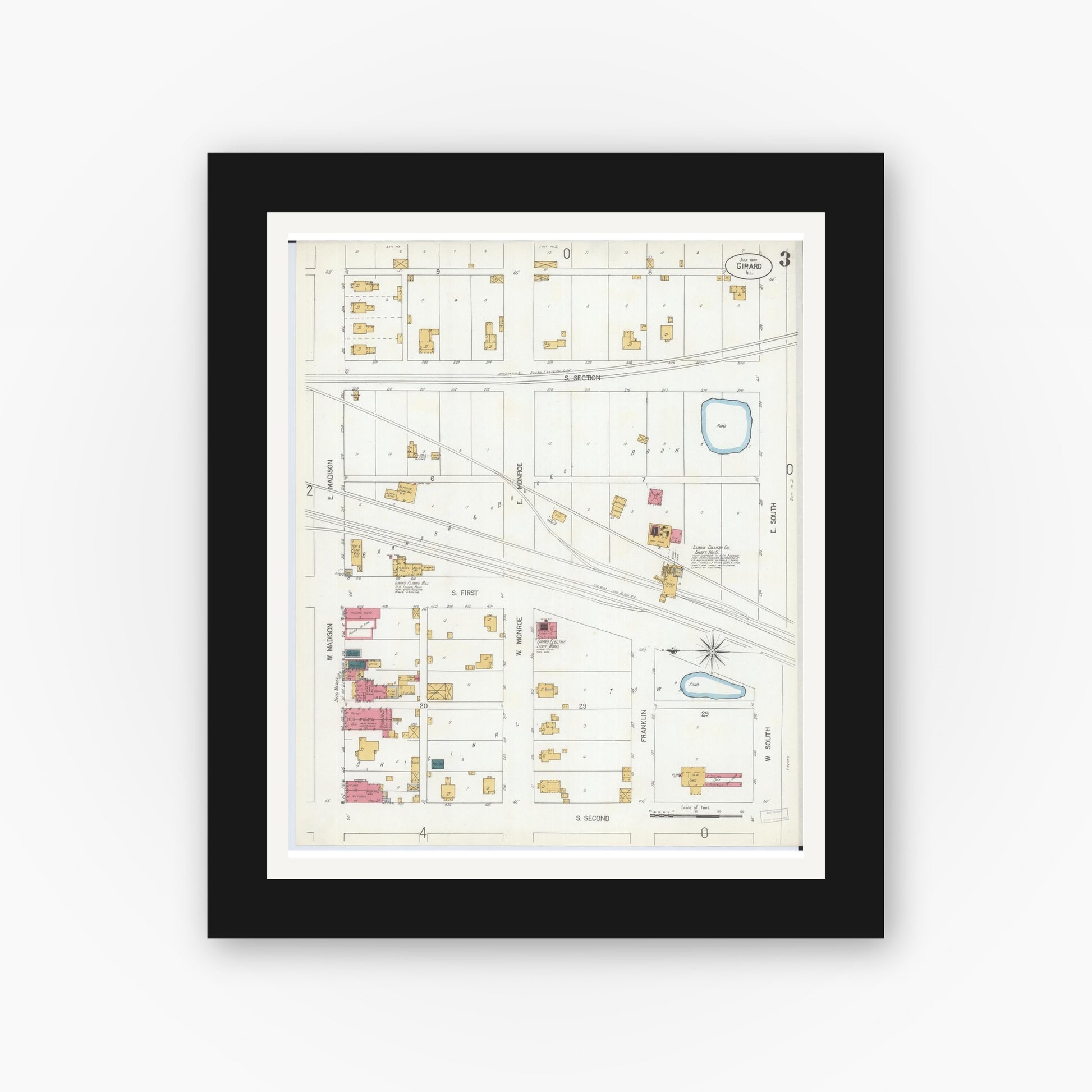 Old map wall art mockup — black gallery frame with white mat — Sanborn Fire Insurance Map from Girard, Macoupin County, Illinois (1906), Sheet #0003