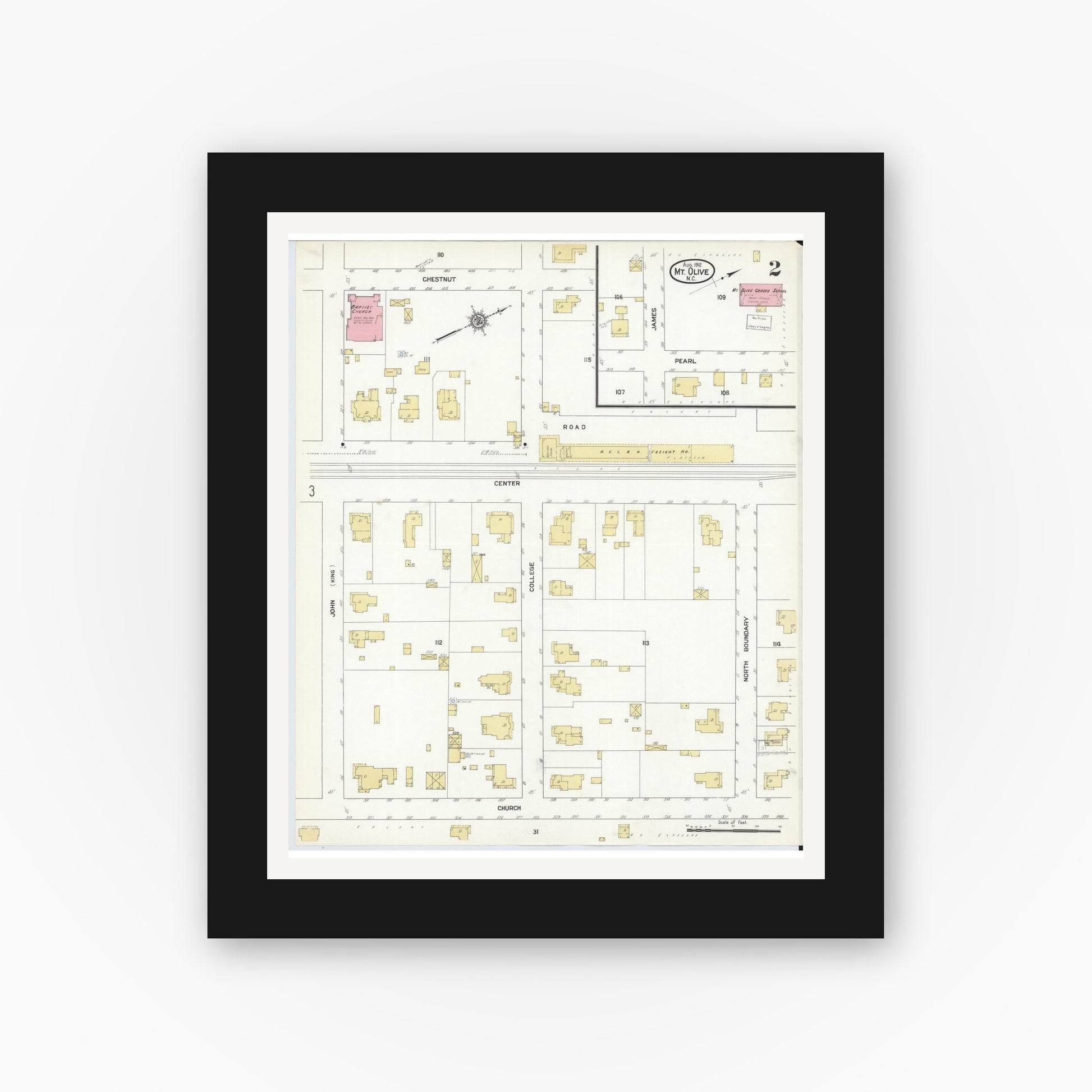 Old map wall art mockup — black gallery frame with white mat — Sanborn Fire Insurance Map from Mount Olive, Wayne County, North Carolina (1912), Sheet #0002