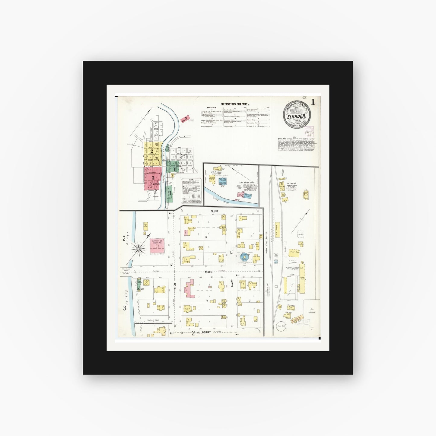 Old map wall art mockup — black gallery frame with white mat — Sanborn Fire Insurance Map from Elkader, Clayton County, Iowa (1902), Sheet #0001