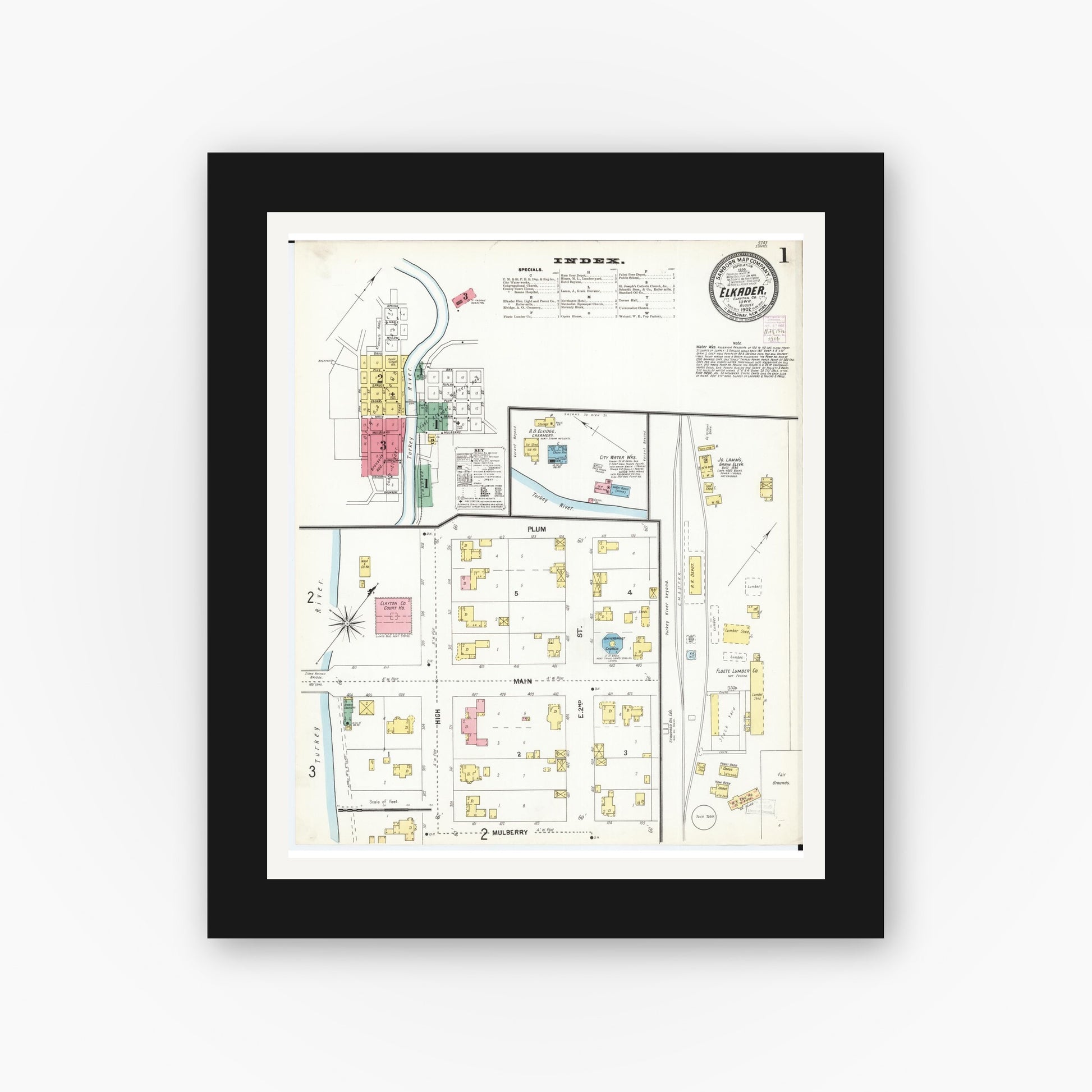 Old map wall art mockup — black gallery frame with white mat — Sanborn Fire Insurance Map from Elkader, Clayton County, Iowa (1902), Sheet #0001