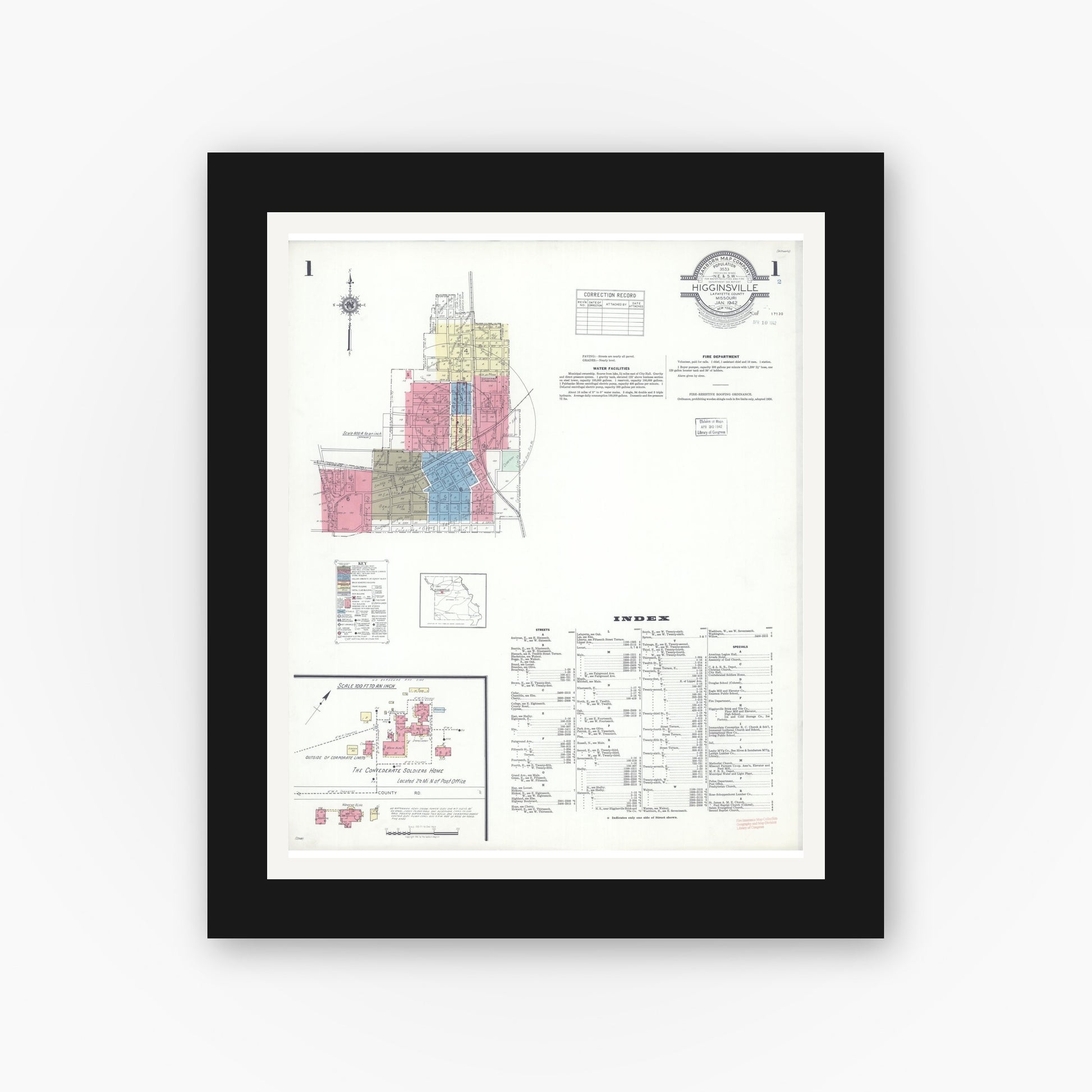 Old map wall art mockup — black gallery frame with white mat — Sanborn Fire Insurance Map from Higginsville, Lafayette County, Missouri (1942) - Complete Map Set