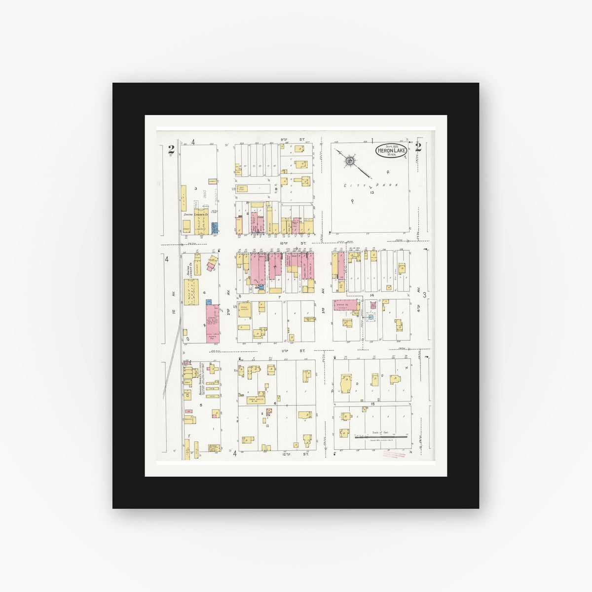 Old map wall art mockup — black gallery frame with white mat — Sanborn Fire Insurance Map from Heron Lake, Jackson County, Minnesota (1926), Sheet #0002