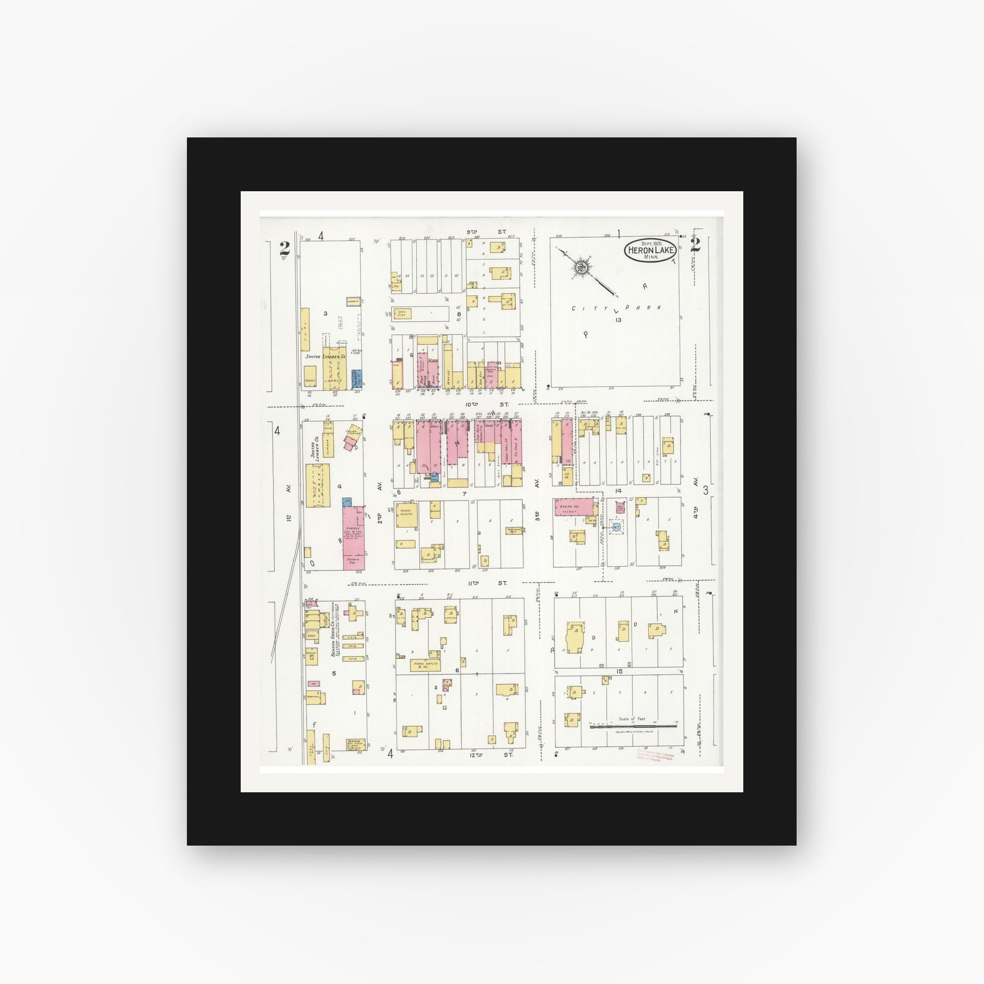 Old map wall art mockup — black gallery frame with white mat — Sanborn Fire Insurance Map from Heron Lake, Jackson County, Minnesota (1926), Sheet #0002