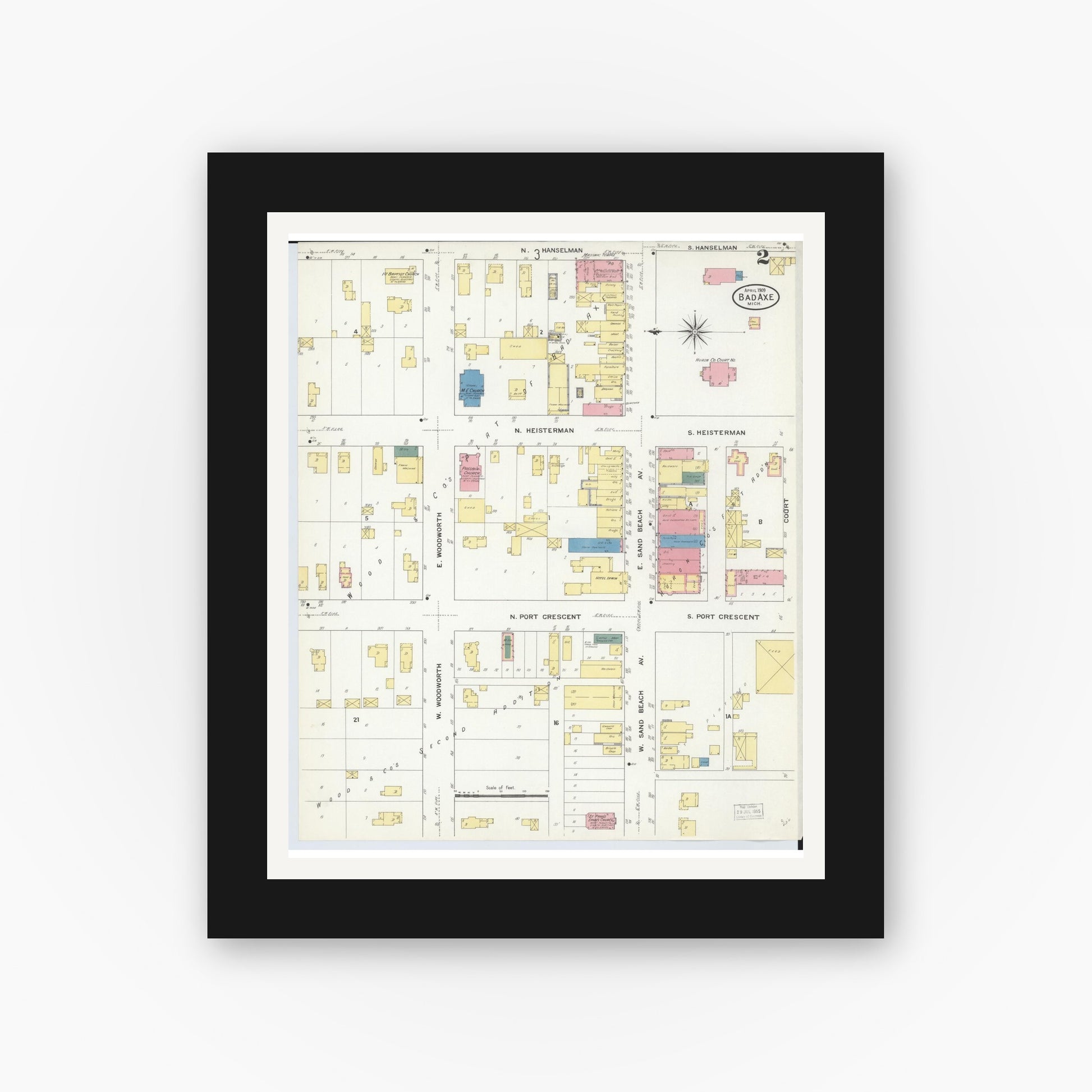Old map wall art mockup — black gallery frame with white mat — Sanborn Fire Insurance Map from Bad Axe, Huron County, Michigan (1909), Sheet #0002