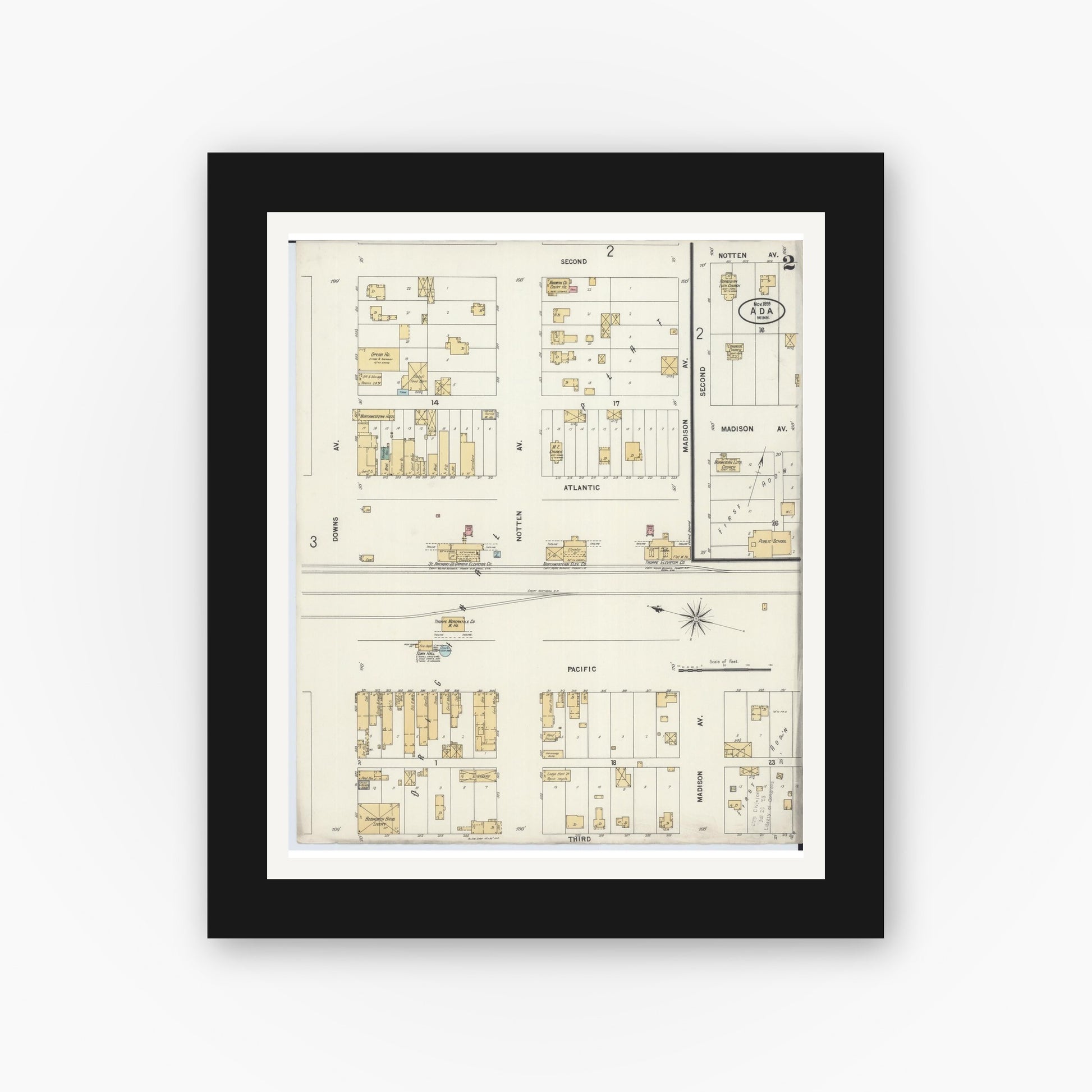 Old map wall art mockup — black gallery frame with white mat — Sanborn Fire Insurance Map from Ada, Norman County, Minnesota (1899), Sheet #0002