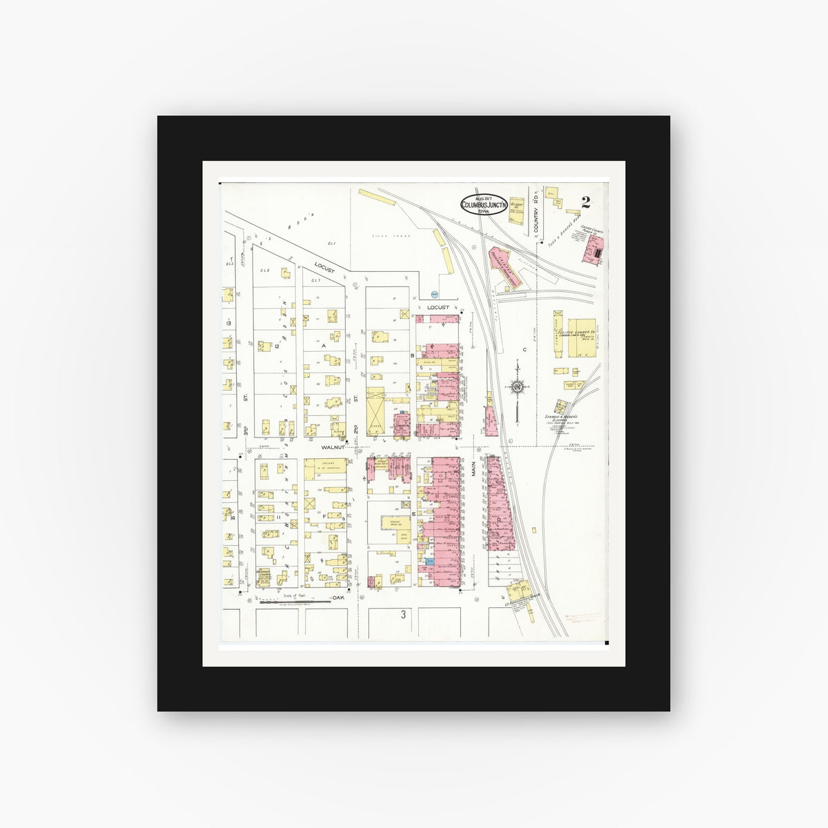 Old map wall art mockup — black gallery frame with white mat — Sanborn Fire Insurance Map from Columbus Junction, Louisa County, Iowa (1917), Sheet #0002