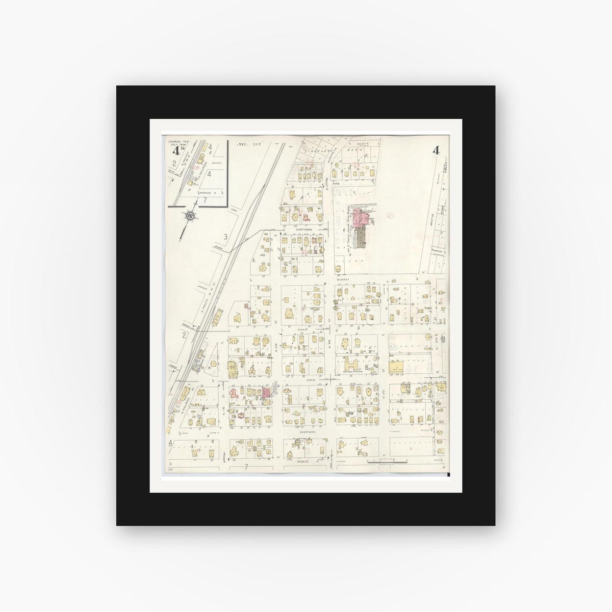 Old map wall art mockup — black gallery frame with white mat — Sanborn Fire Insurance Map from Conroe, Montgomery County, Texas (1943), Sheet #0004