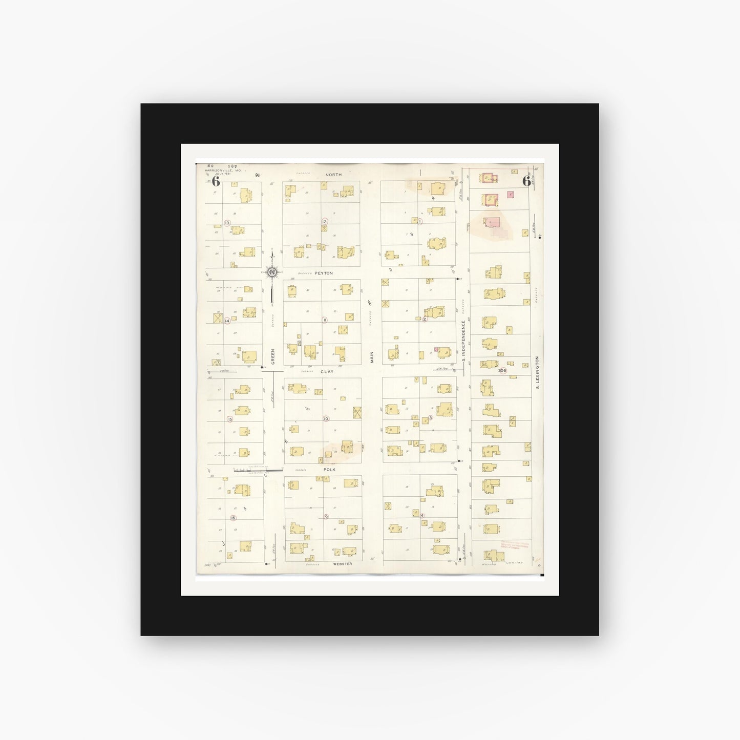 Old map wall art mockup — black gallery frame with white mat — Sanborn Fire Insurance Map from Harrisonville, Cass County, Missouri (1939), Sheet #0006