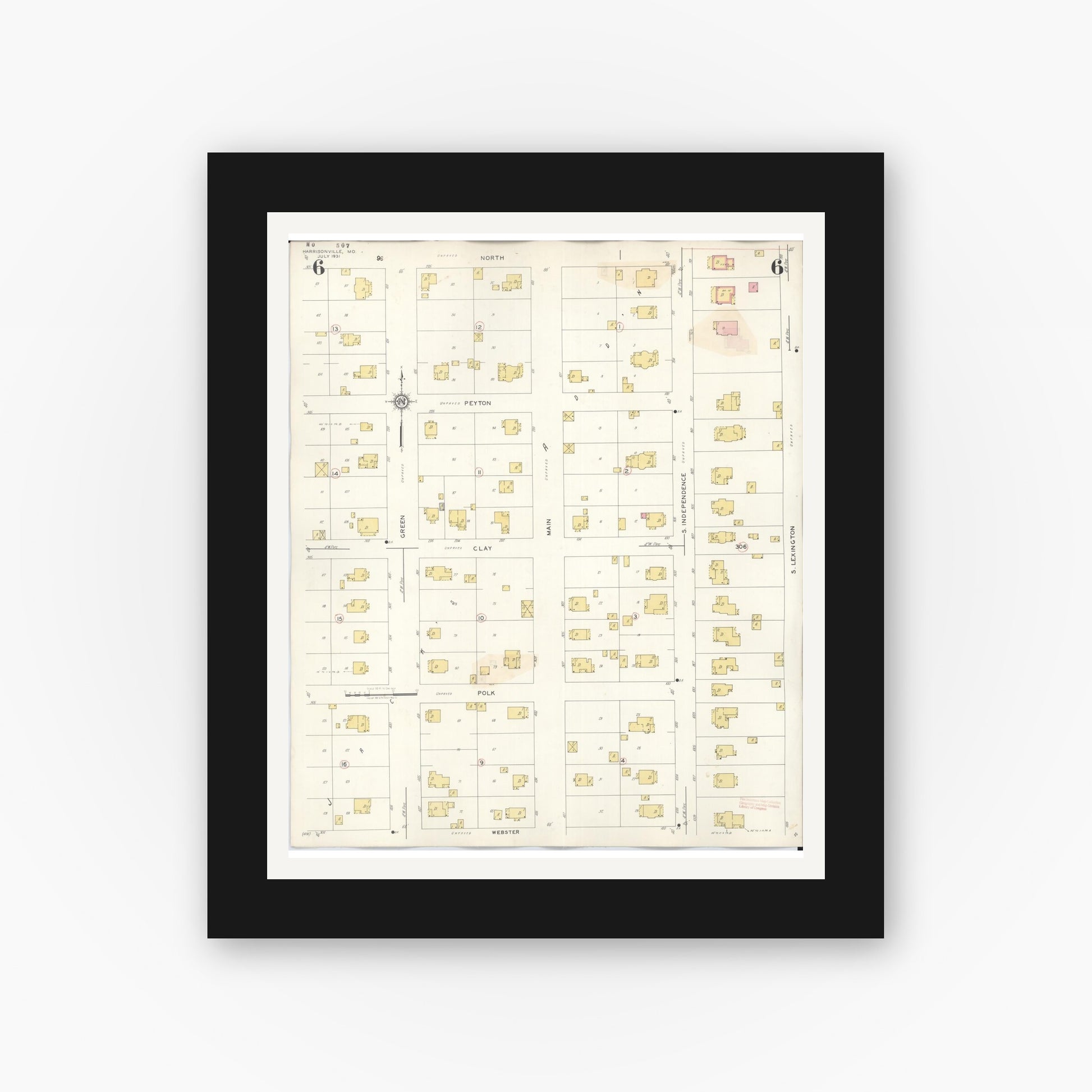 Old map wall art mockup — black gallery frame with white mat — Sanborn Fire Insurance Map from Harrisonville, Cass County, Missouri (1939), Sheet #0006