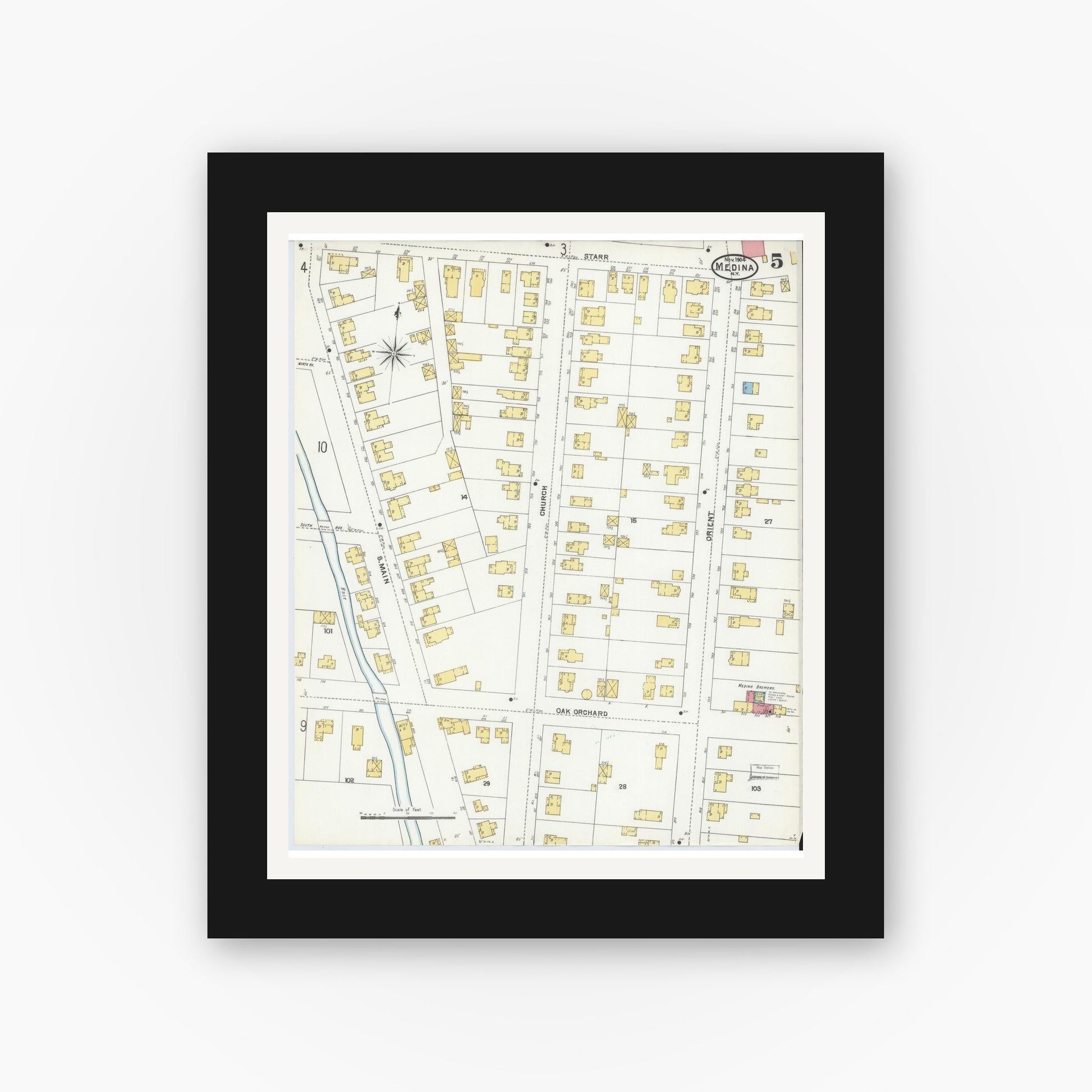Old map wall art mockup — black gallery frame with white mat — Sanborn Fire Insurance Map from Medina, Orleans County, New York (1904), Sheet #0005