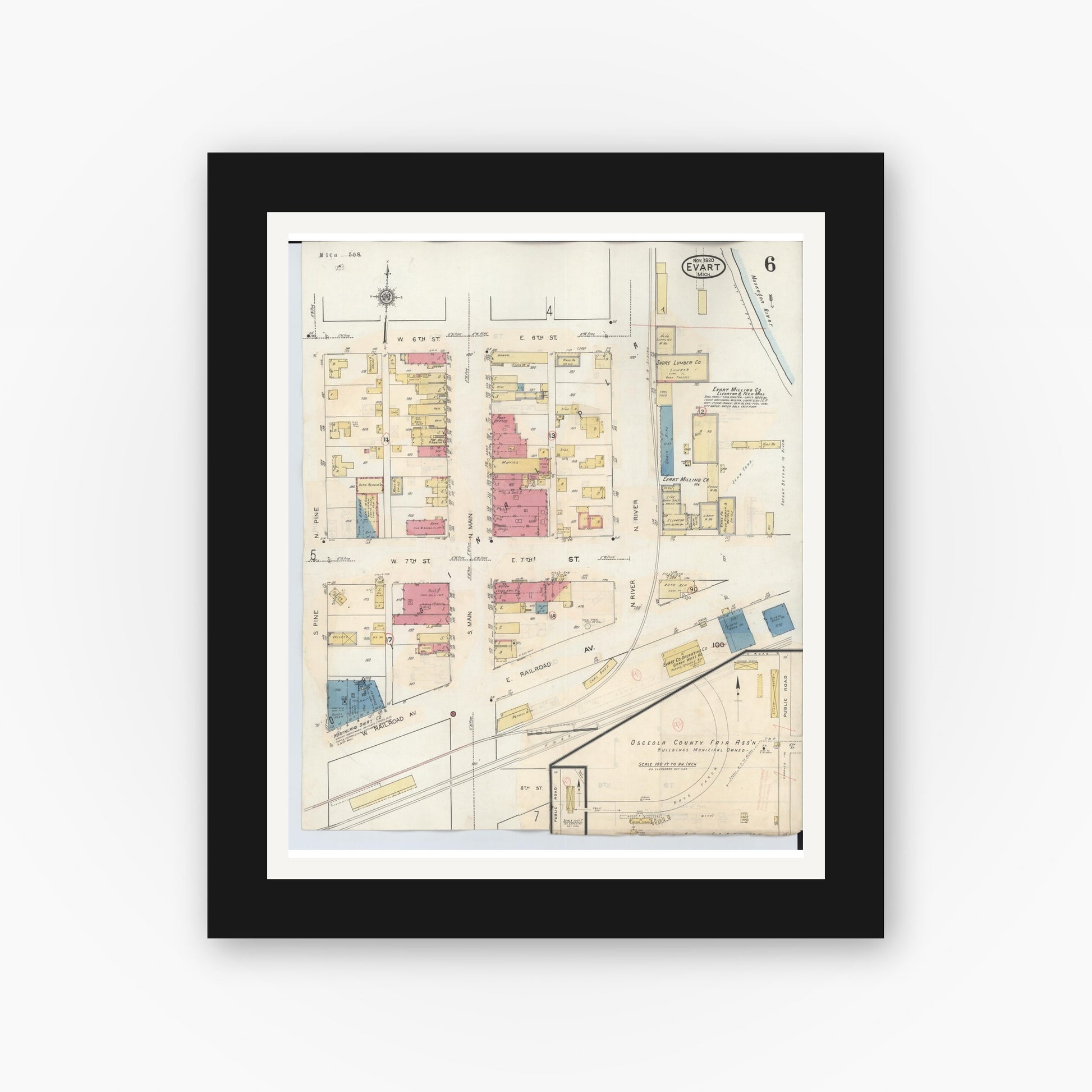 Old map wall art mockup — black gallery frame with white mat — Sanborn Fire Insurance Map from Evart, Osceola County, Michigan (1942), Sheet #0006