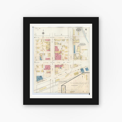 Old map wall art mockup — black gallery frame with white mat — Sanborn Fire Insurance Map from Evart, Osceola County, Michigan (1942), Sheet #0006