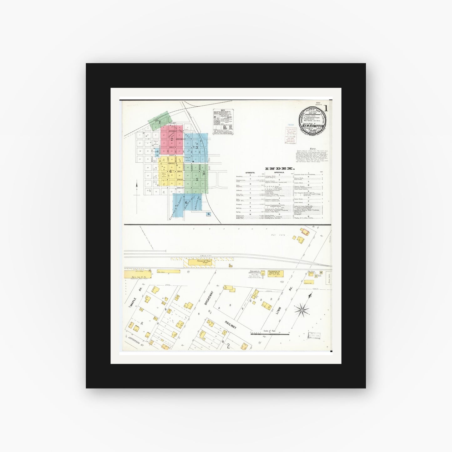 Old map wall art mockup — black gallery frame with white mat — Sanborn Fire Insurance Map from New Hampton, Chickasaw County, Iowa (1900) â€” Complete Set