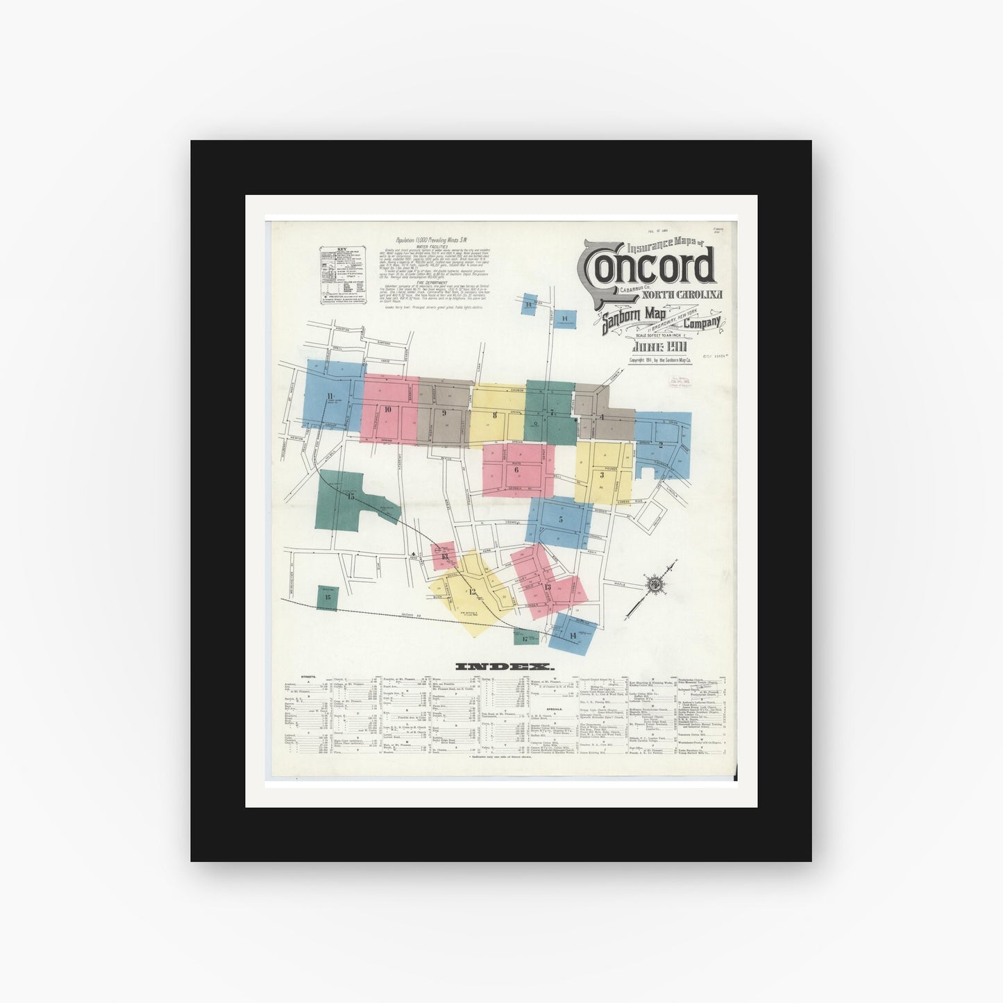 Old map wall art mockup — black gallery frame with white mat — Sanborn Fire Insurance Map from Concord, Cabarrus County, North Carolina (1911) - Complete Map Set