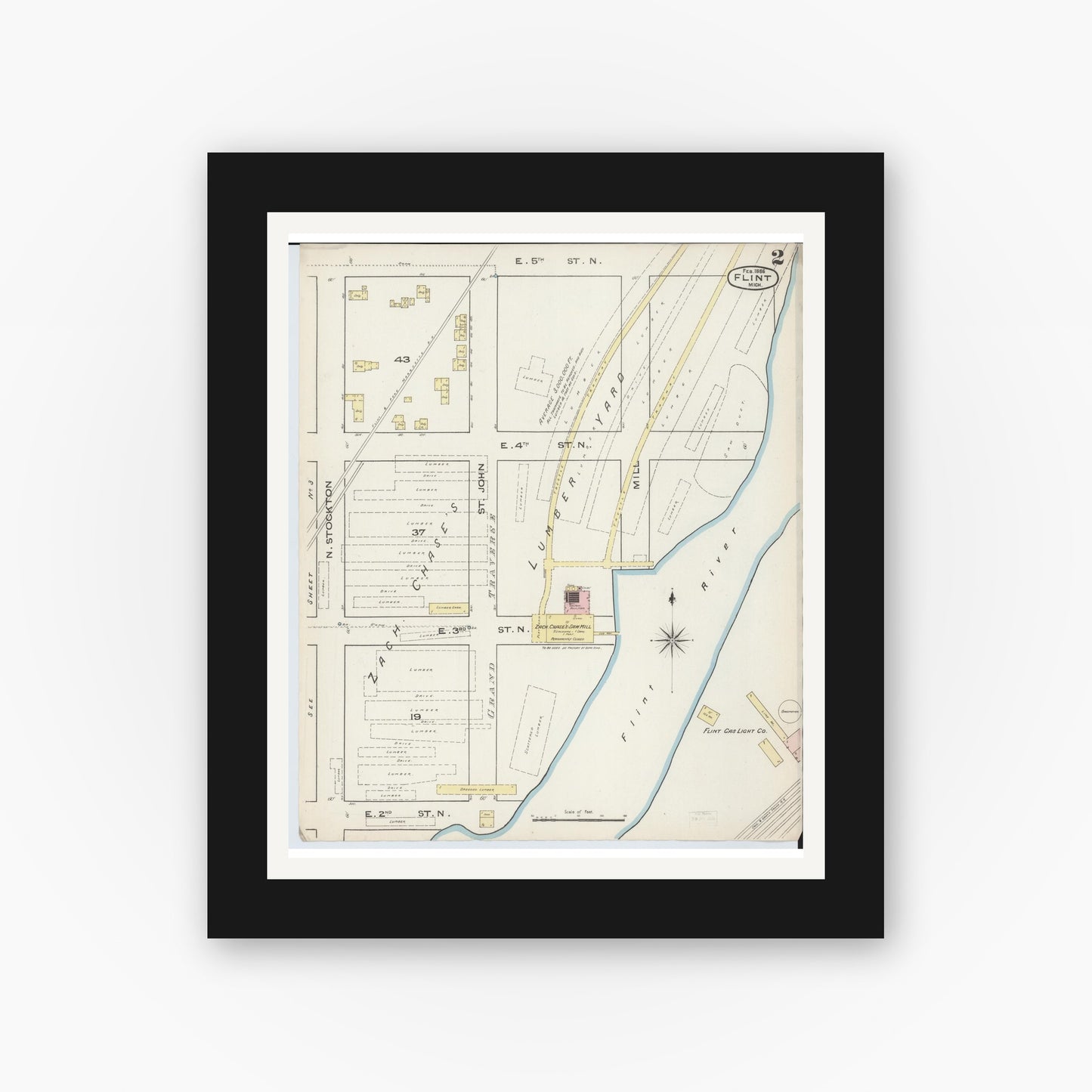 Old map wall art mockup — black gallery frame with white mat — Sanborn Fire Insurance Map from Flint, Genesee County, Michigan (1886), Sheet #0002