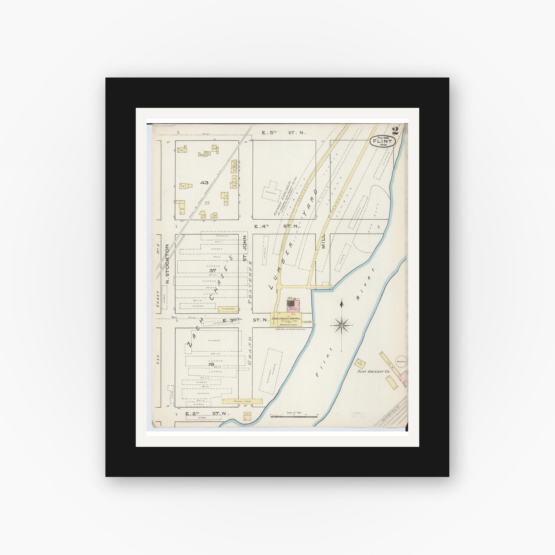 Old map wall art mockup — black gallery frame with white mat — Sanborn Fire Insurance Map from Flint, Genesee County, Michigan (1886), Sheet #0002
