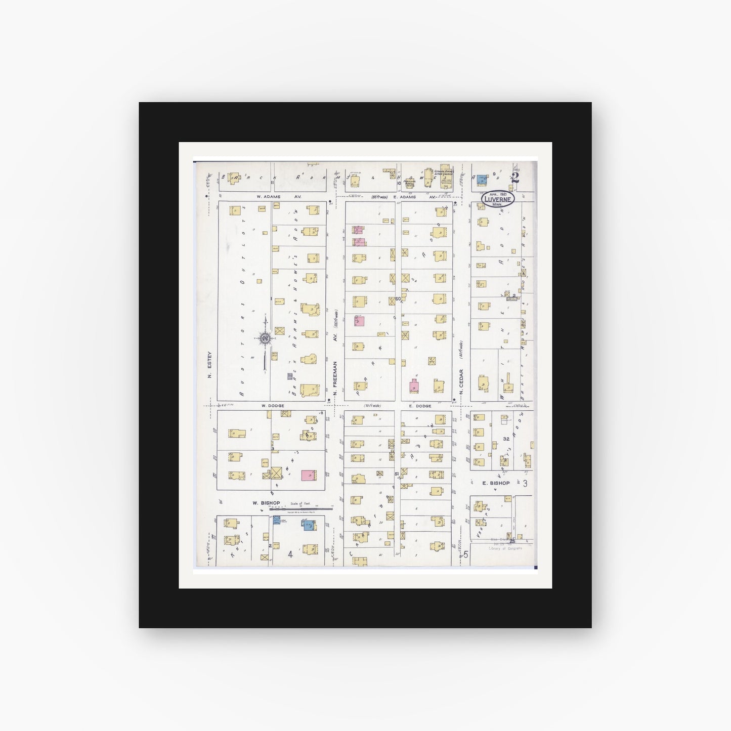 Old map wall art mockup — black gallery frame with white mat — Sanborn Fire Insurance Map from Luverne, Rock County, Minnesota (1921), Sheet #0002