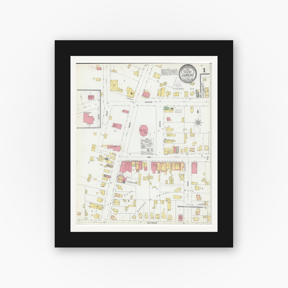 Old map wall art mockup — black gallery frame with white mat — Sanborn Fire Insurance Map from Juneau, Dodge County, Wisconsin (1904), Sheet #0001