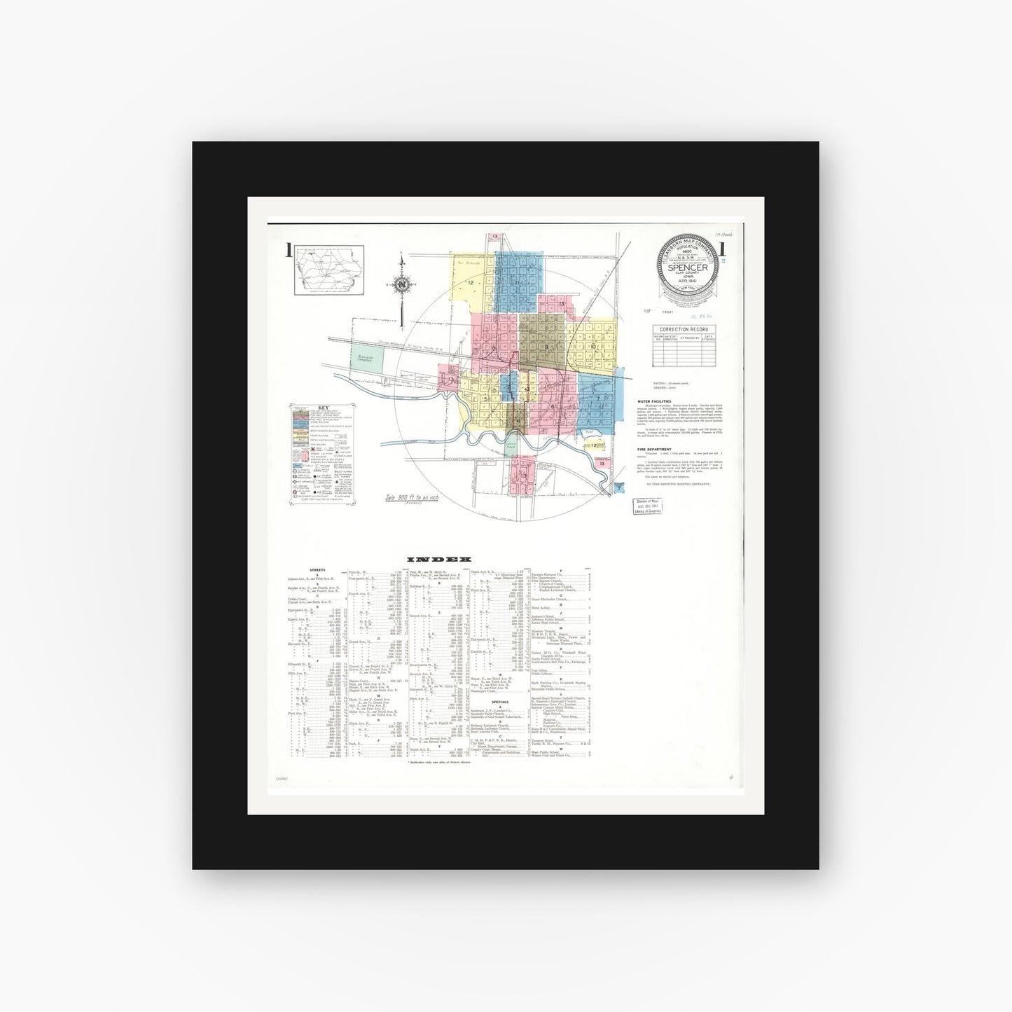 Old map wall art mockup — black gallery frame with white mat — Sanborn Fire Insurance Map from Spencer, Clay County, Iowa (1941) â€” Complete Set