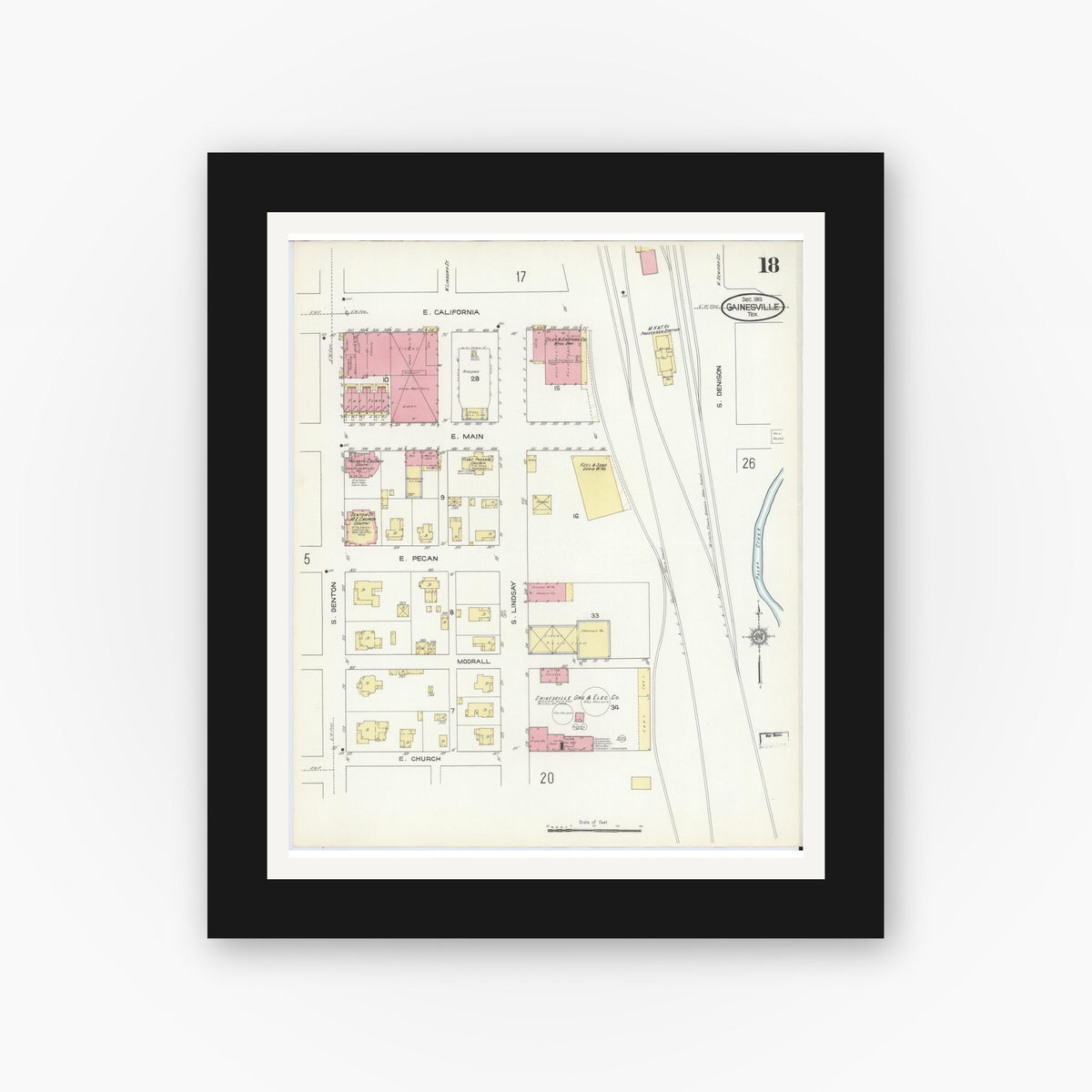 Old map wall art mockup — black gallery frame with white mat — Sanborn Fire Insurance Map from Gainesville, Cooke County, Texas (1913), Sheet #0018