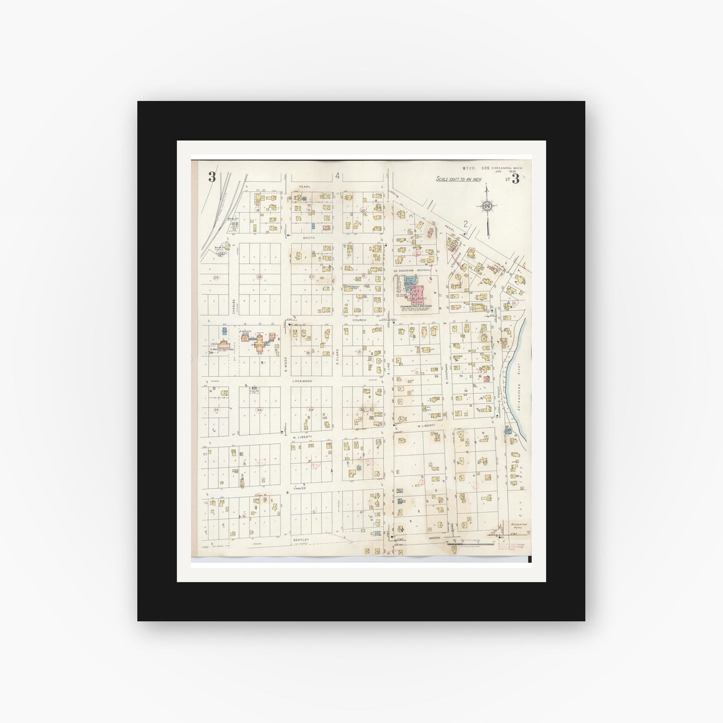 Old map wall art mockup — black gallery frame with white mat — Sanborn Fire Insurance Map from Chesaning, Saginaw County, Michigan (1944), Sheet #0003