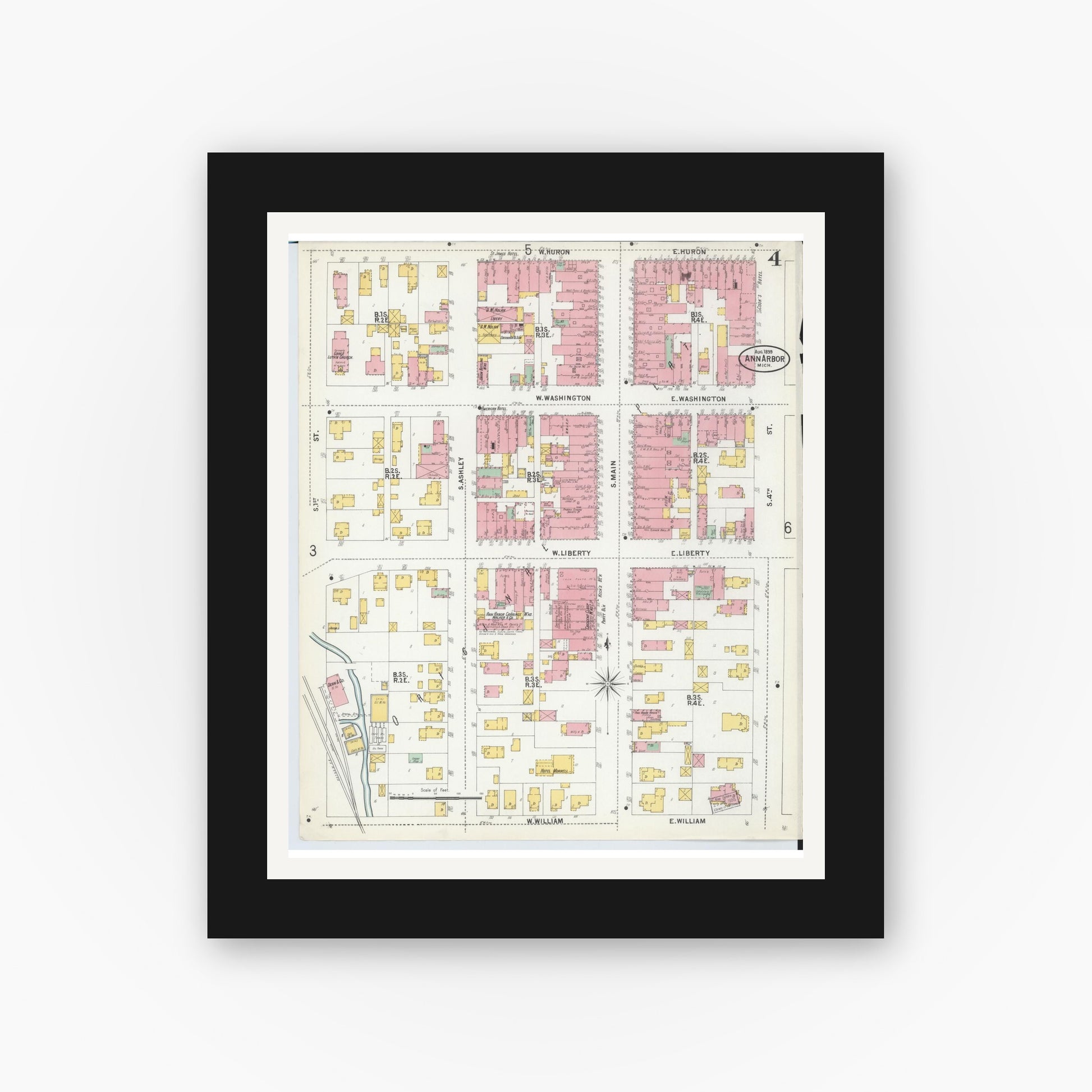Old map wall art mockup — black gallery frame with white mat — Sanborn Fire Insurance Map from Ann Arbor, Washtenaw County, Michigan (1899), Sheet #0004