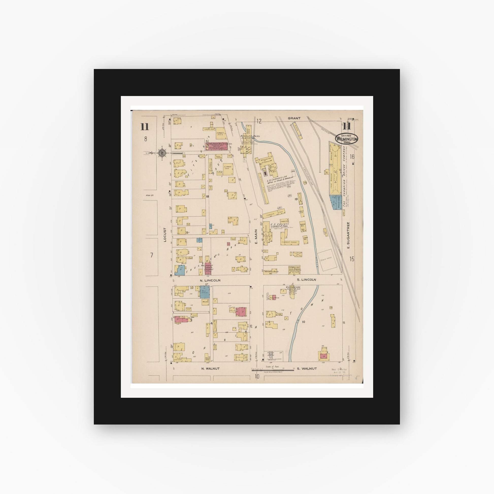 Old map wall art mockup — black gallery frame with white mat — Sanborn Fire Insurance Map from Wilmington, Clinton County, Ohio (1922), Sheet #0011