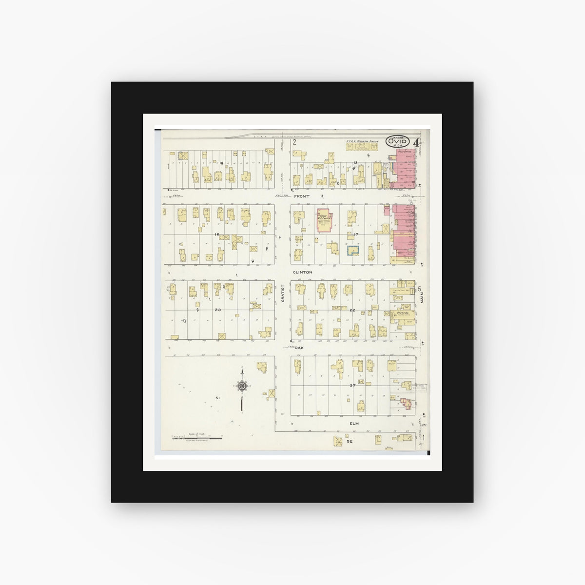 Old map wall art mockup — black gallery frame with white mat — Sanborn Fire Insurance Map from Ovid, Clinton County, Michigan (1918), Sheet #0004