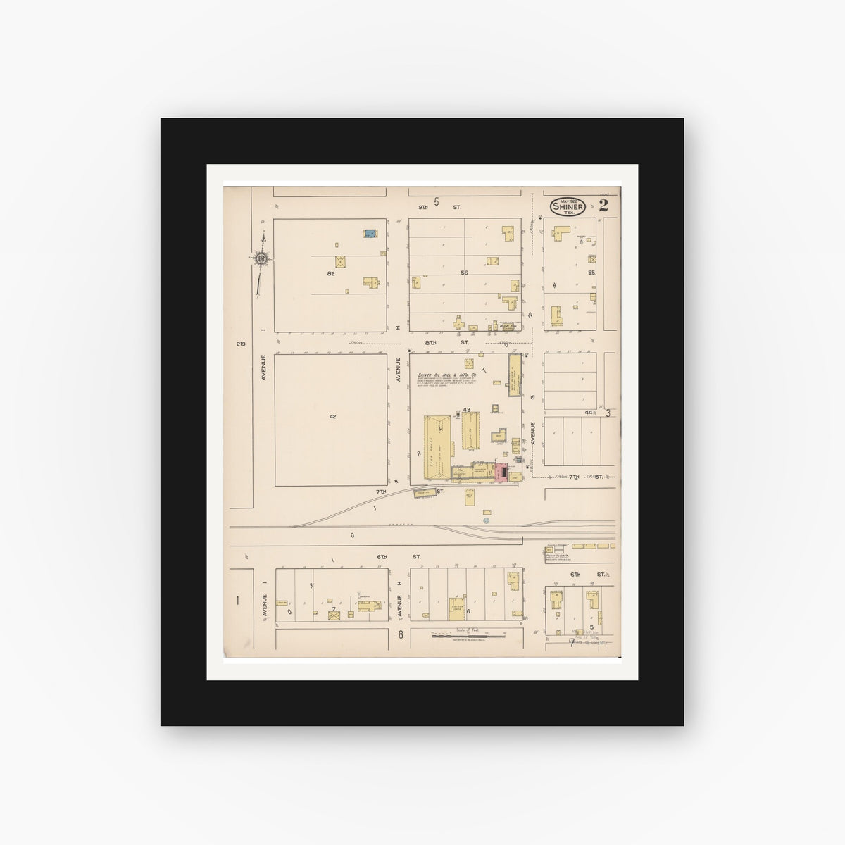 Old map wall art mockup — black gallery frame with white mat — Sanborn Fire Insurance Map from Shiner, Lavaca County, Texas (1922), Sheet #0002