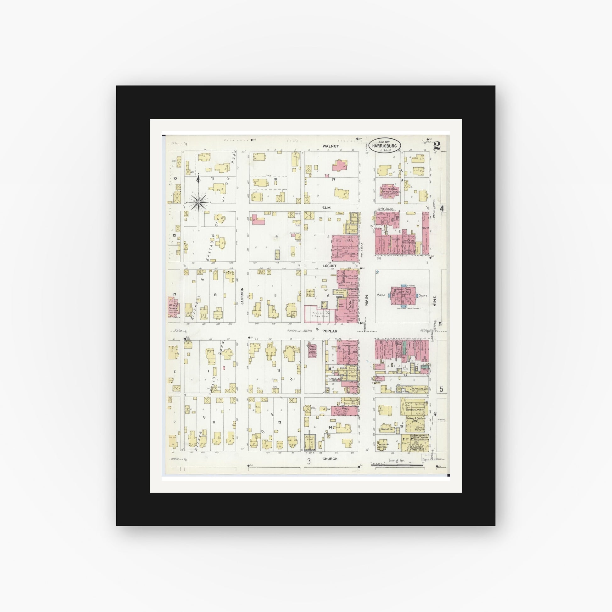 Old map wall art mockup — black gallery frame with white mat — Sanborn Fire Insurance Map from Harrisburg, Saline County, Illinois (1907), Sheet #0002