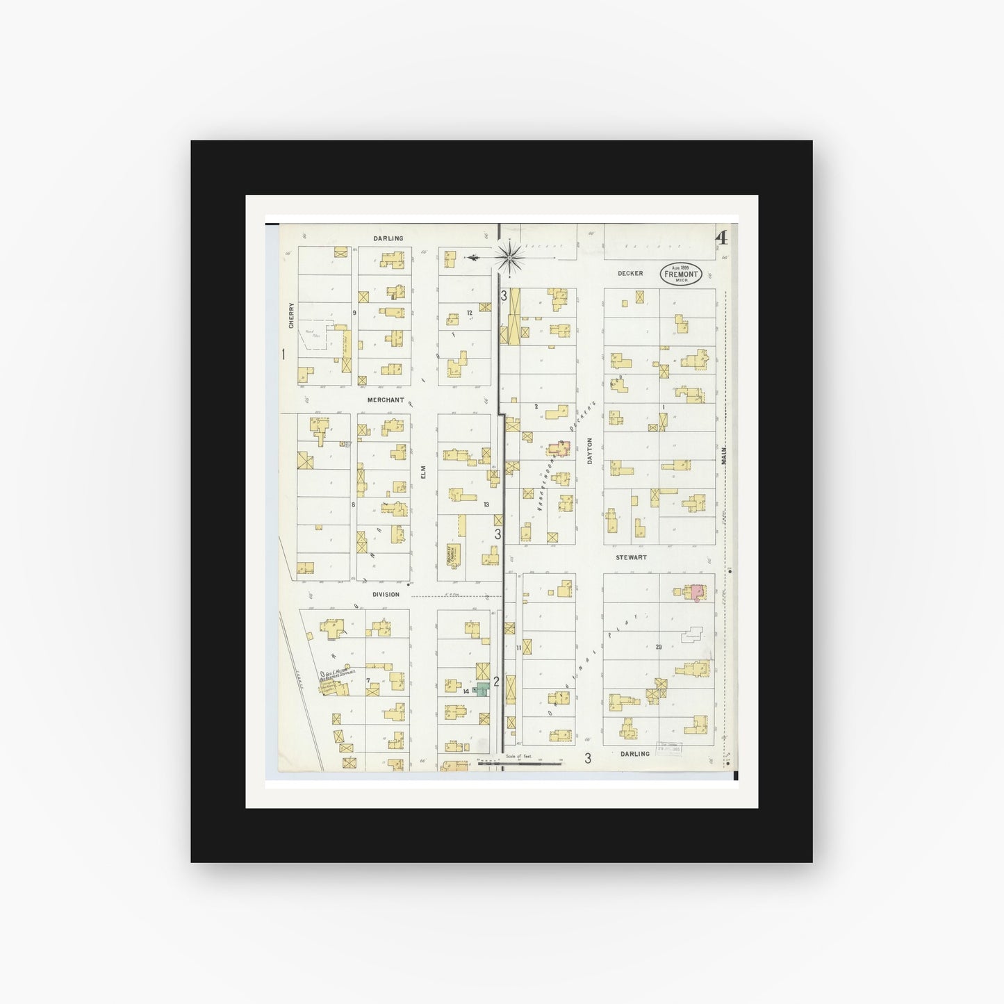 Old map wall art mockup — black gallery frame with white mat — Sanborn Fire Insurance Map from Fremont, Newaygo County, Michigan (1899), Sheet #0004