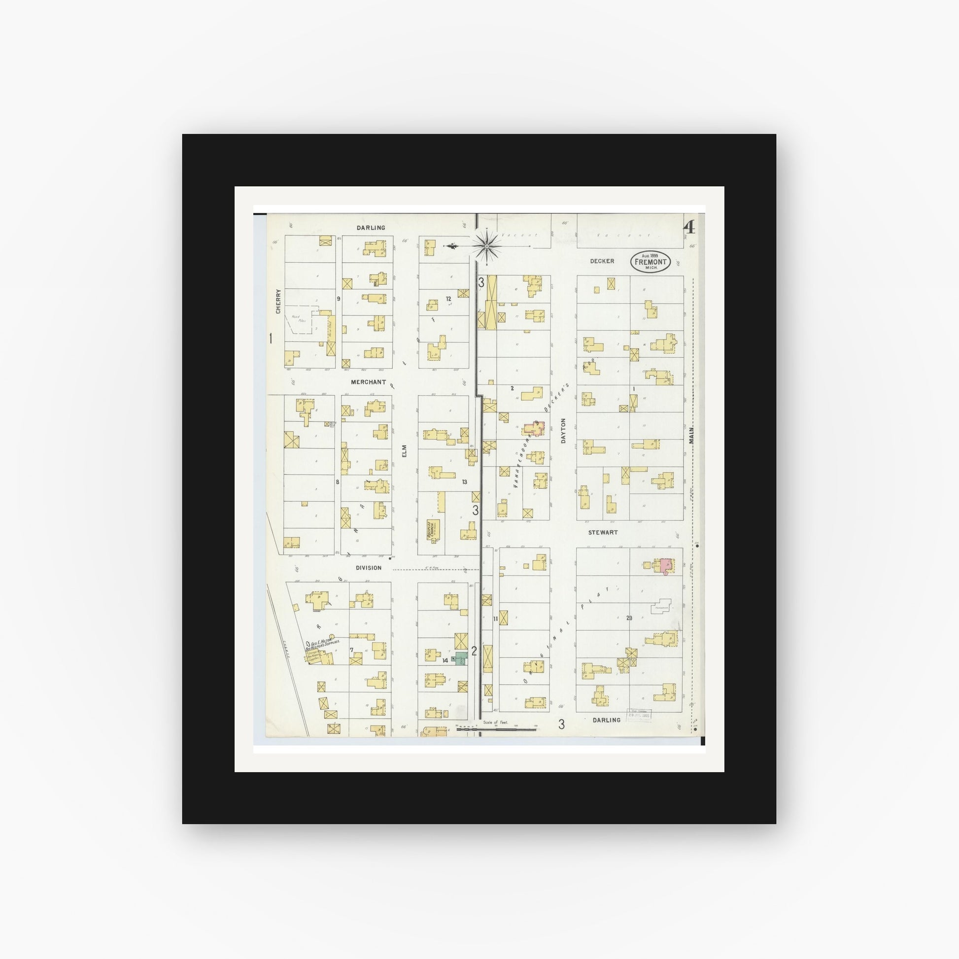 Old map wall art mockup — black gallery frame with white mat — Sanborn Fire Insurance Map from Fremont, Newaygo County, Michigan (1899), Sheet #0004
