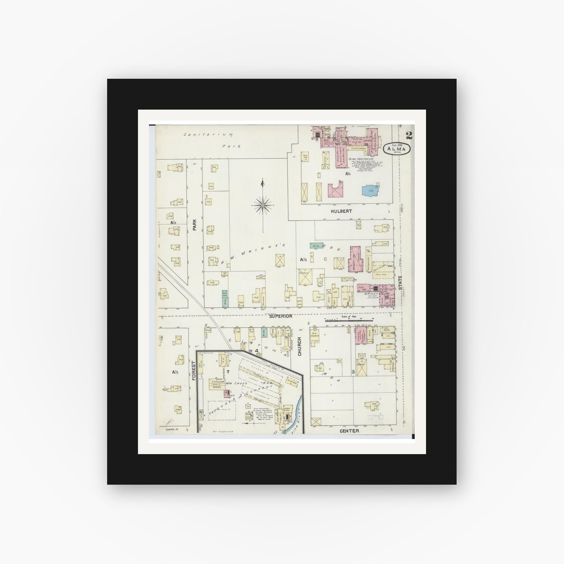 Old map wall art mockup — black gallery frame with white mat — Sanborn Fire Insurance Map from Alma, Gratiot County, Michigan (1890), Sheet #0002