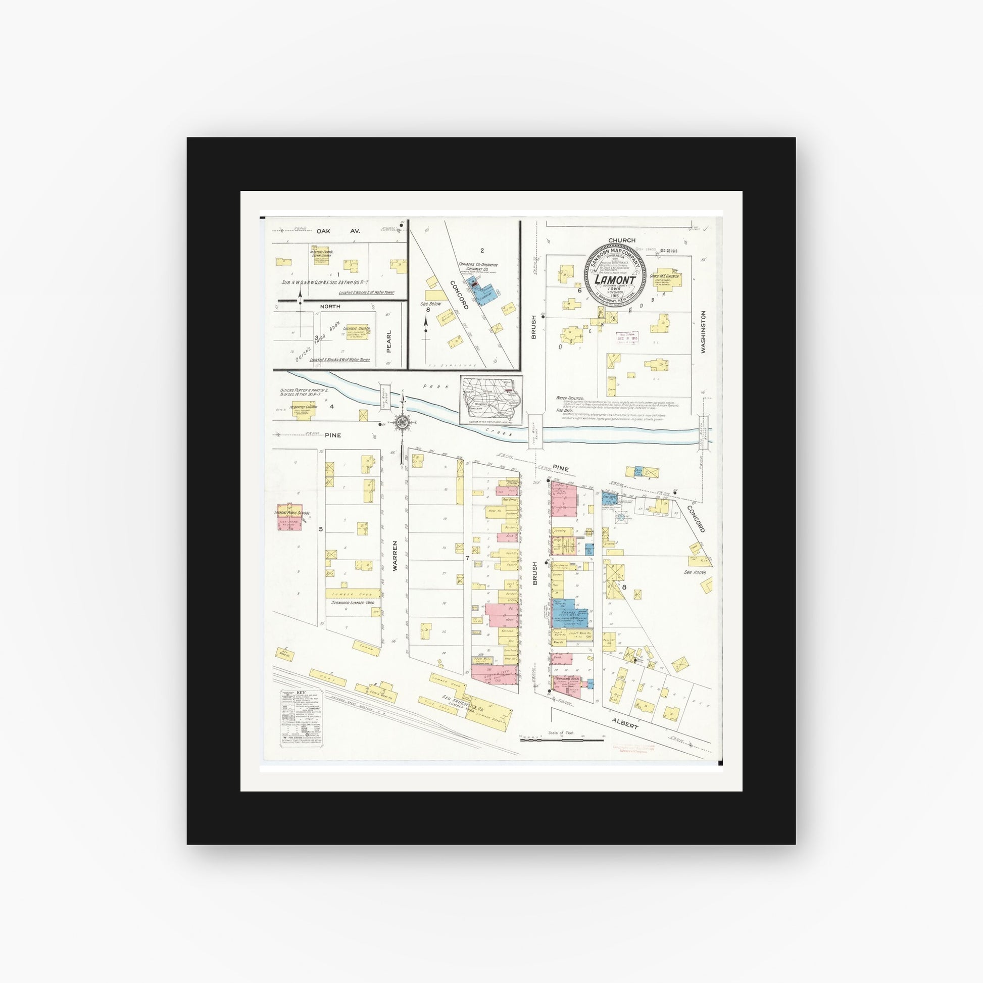 Old map wall art mockup — black gallery frame with white mat — Sanborn Fire Insurance Map from Lamont, Buchanan County, Iowa (1915), Sheet #0001