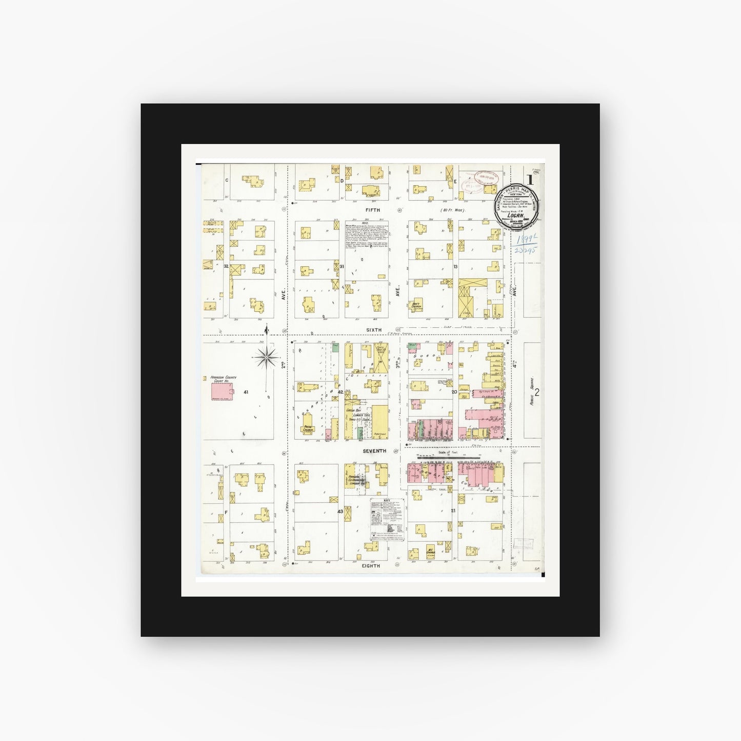 Old map wall art mockup — black gallery frame with white mat — Sanborn Fire Insurance Map from Logan, Harrison County, Iowa (1899) â€” Complete Set