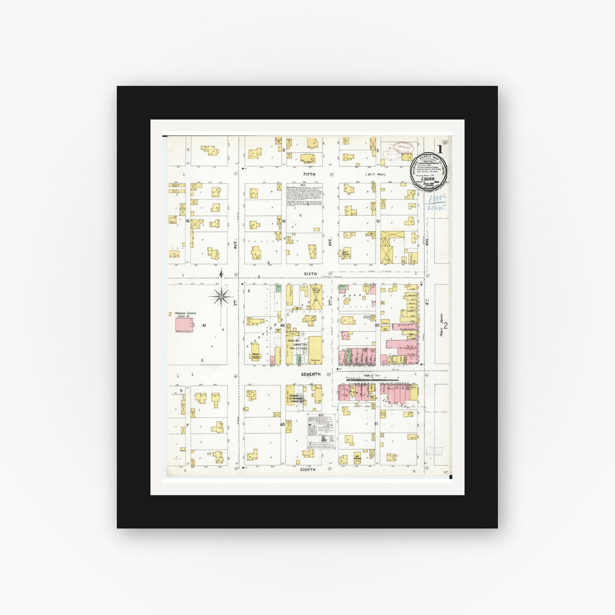 Old map wall art mockup — black gallery frame with white mat — Sanborn Fire Insurance Map from Logan, Harrison County, Iowa (1899) â€” Complete Set